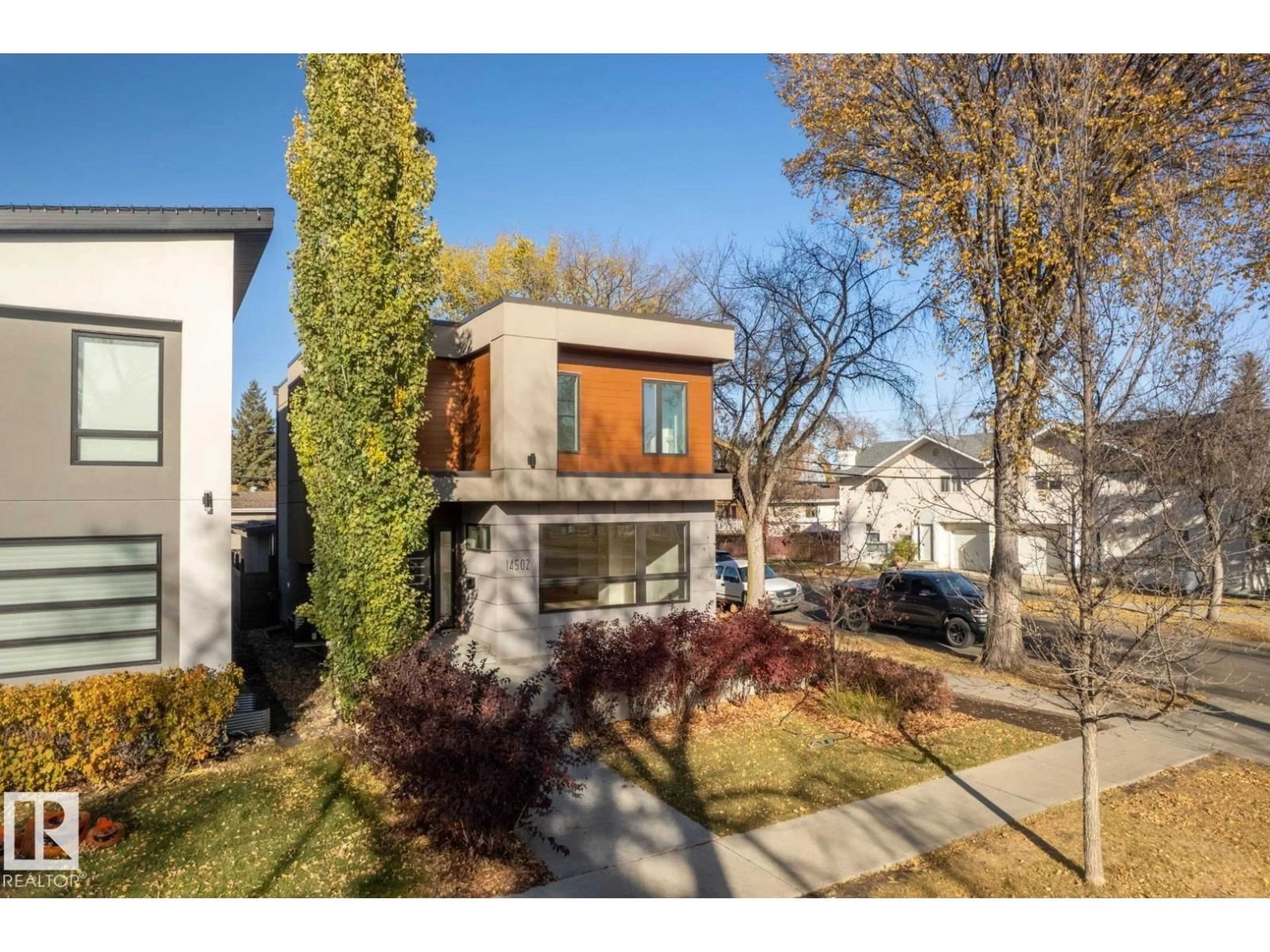 Home with brick exterior material, street for 14502 103 AV, Edmonton Alberta T5W0T4