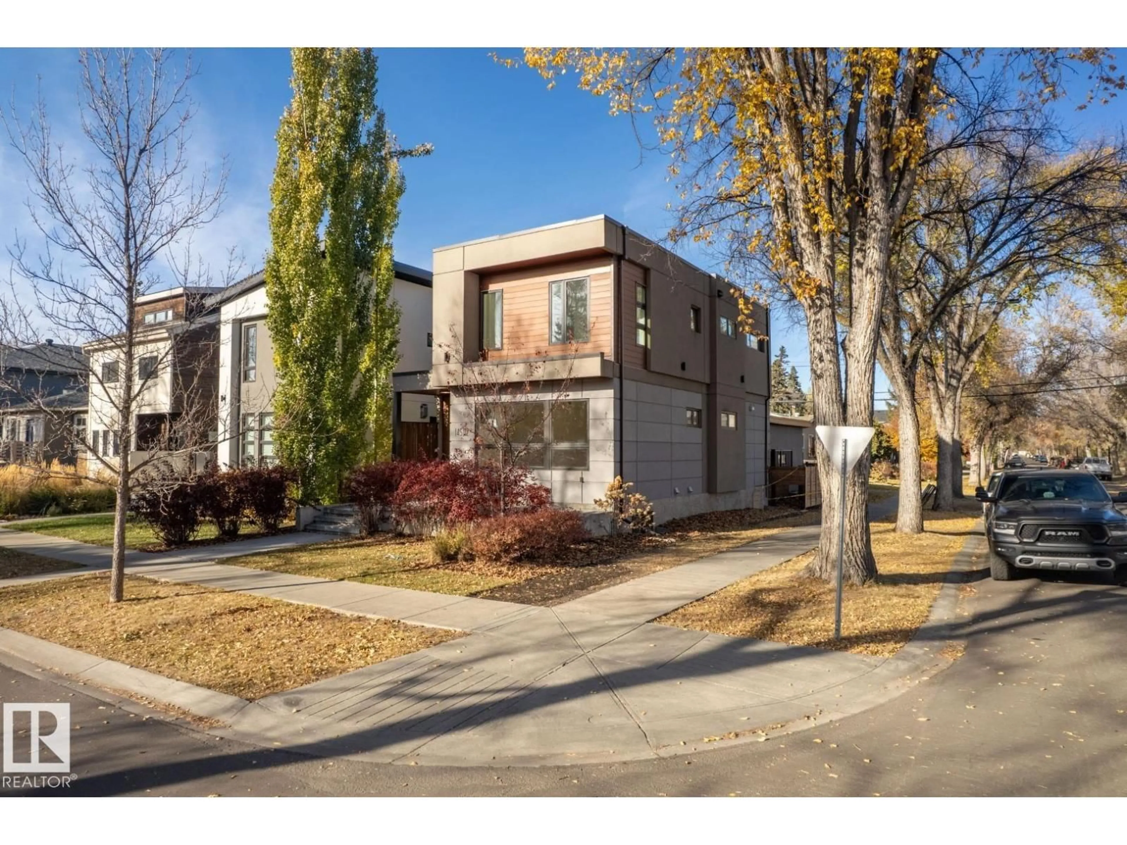 Home with brick exterior material, street for 14502 103 AV, Edmonton Alberta T5W0T4
