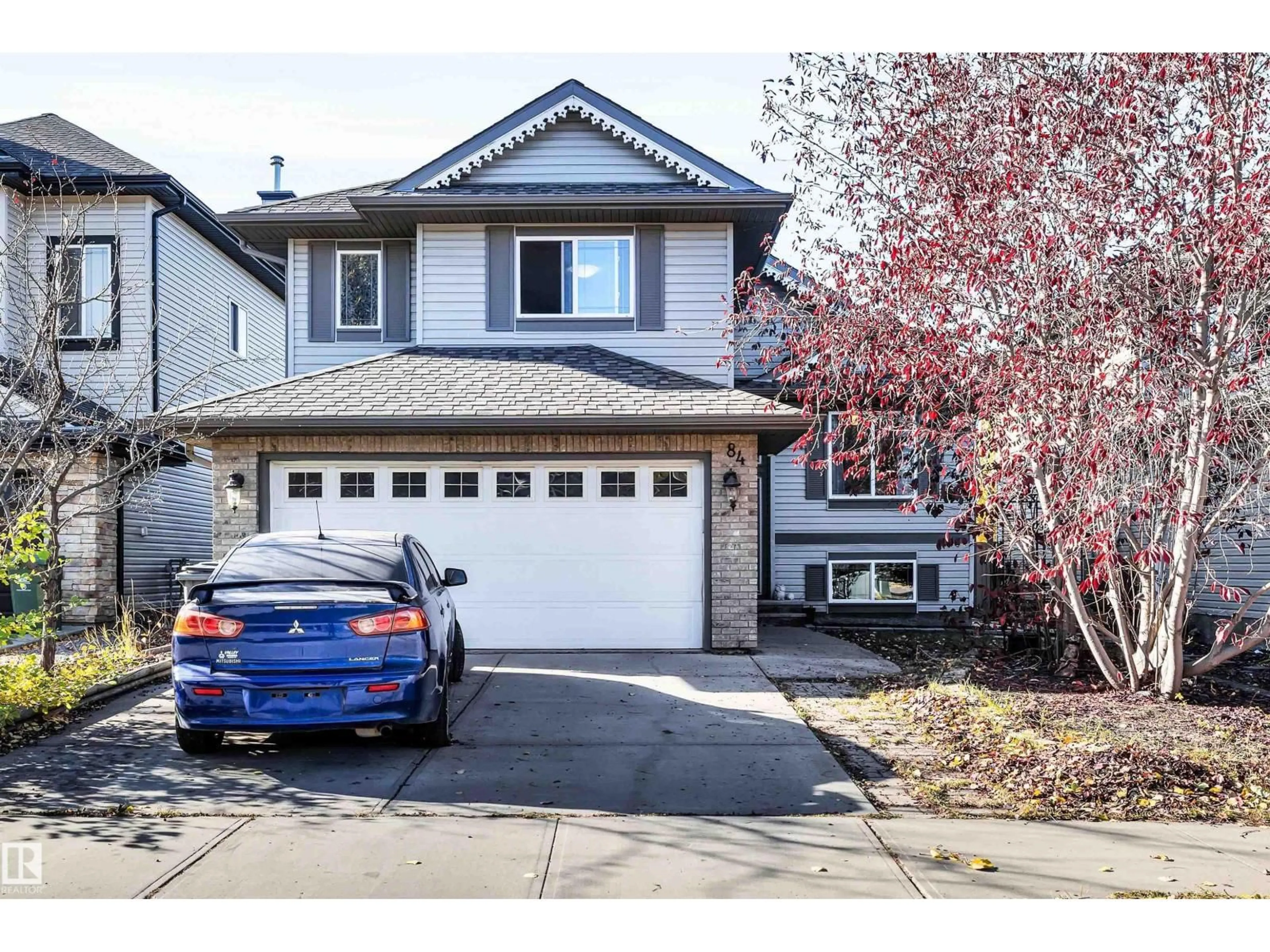 Home with vinyl exterior material, street for 84 RUE MOREAU, Beaumont Alberta T4X1V7