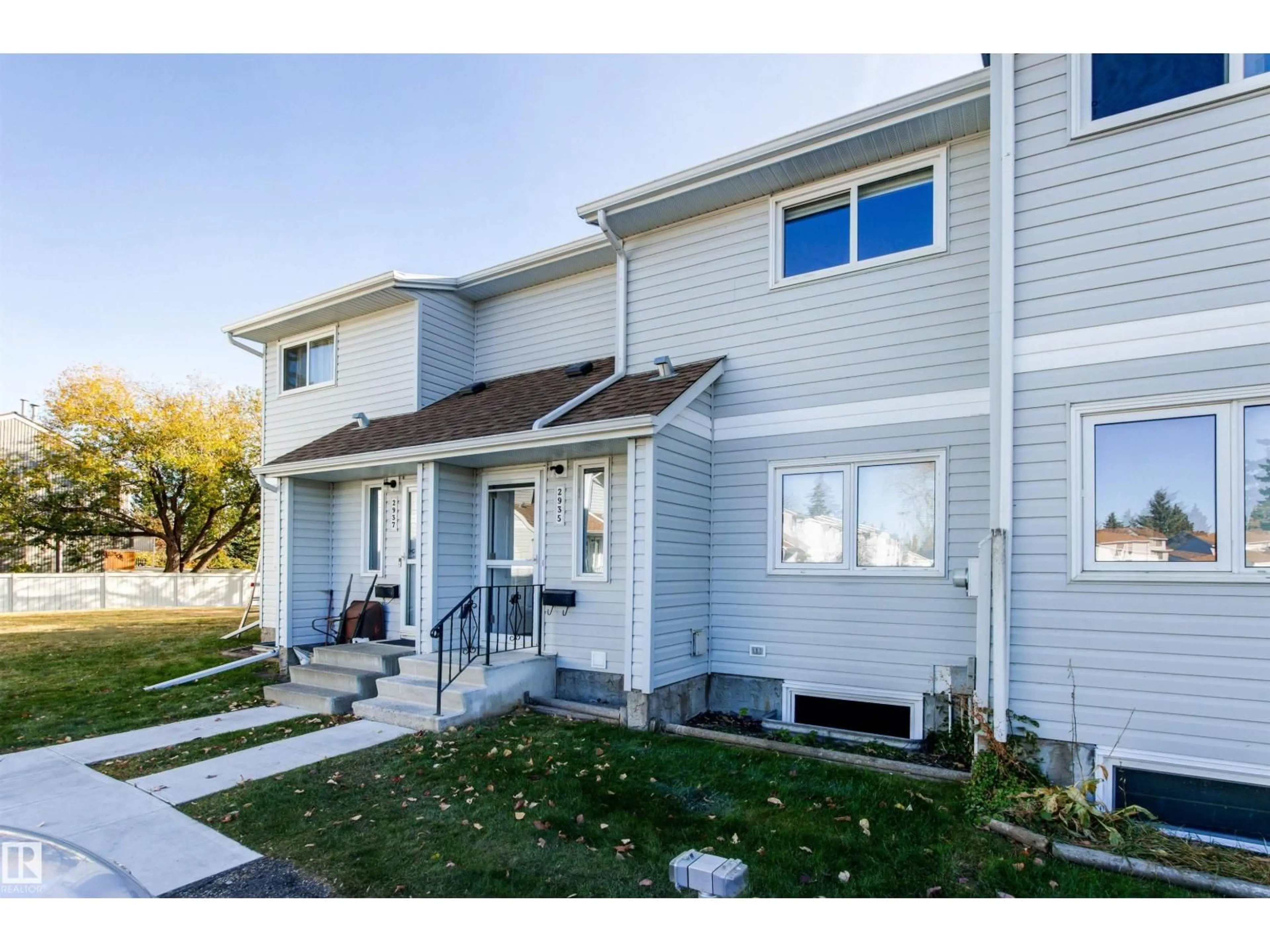 Home with vinyl exterior material, street for NW - 2935 109 ST, Edmonton Alberta T6J4N6