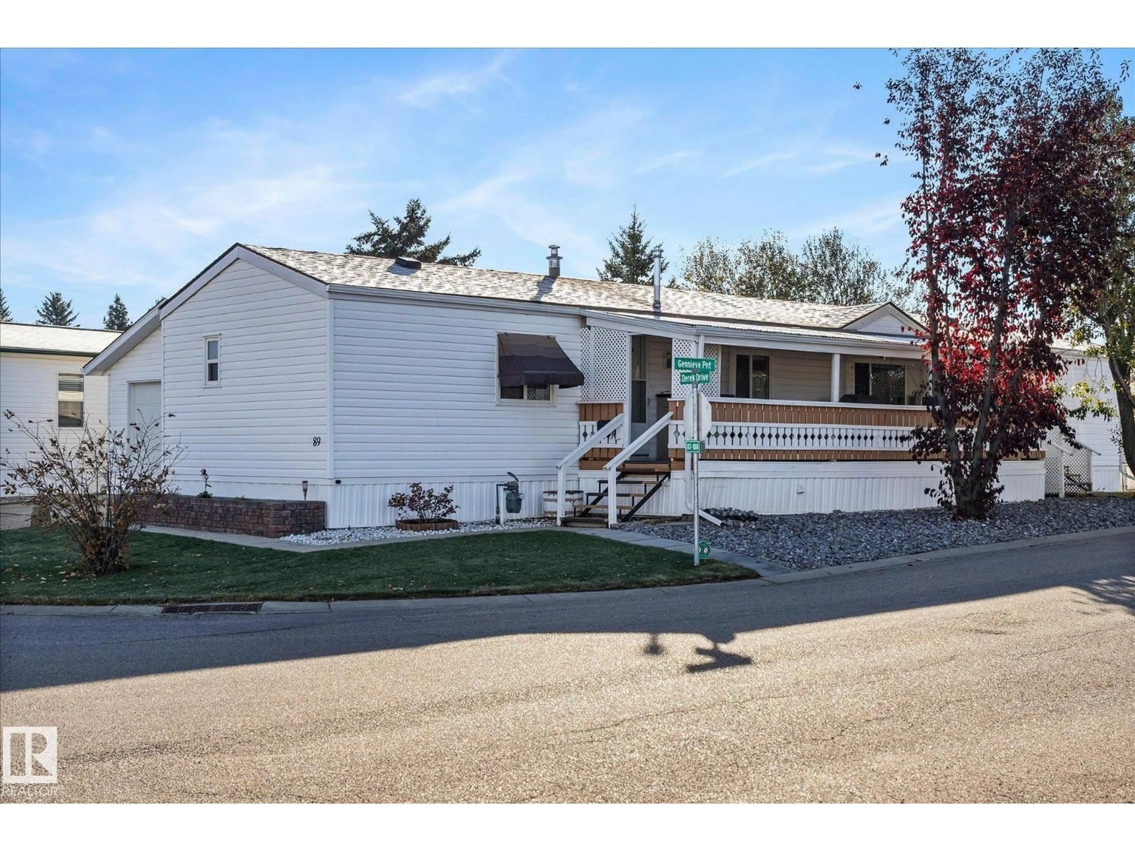 Home with vinyl exterior material, street for 89 3400 48 ST, Stony Plain Alberta T7Z1C1