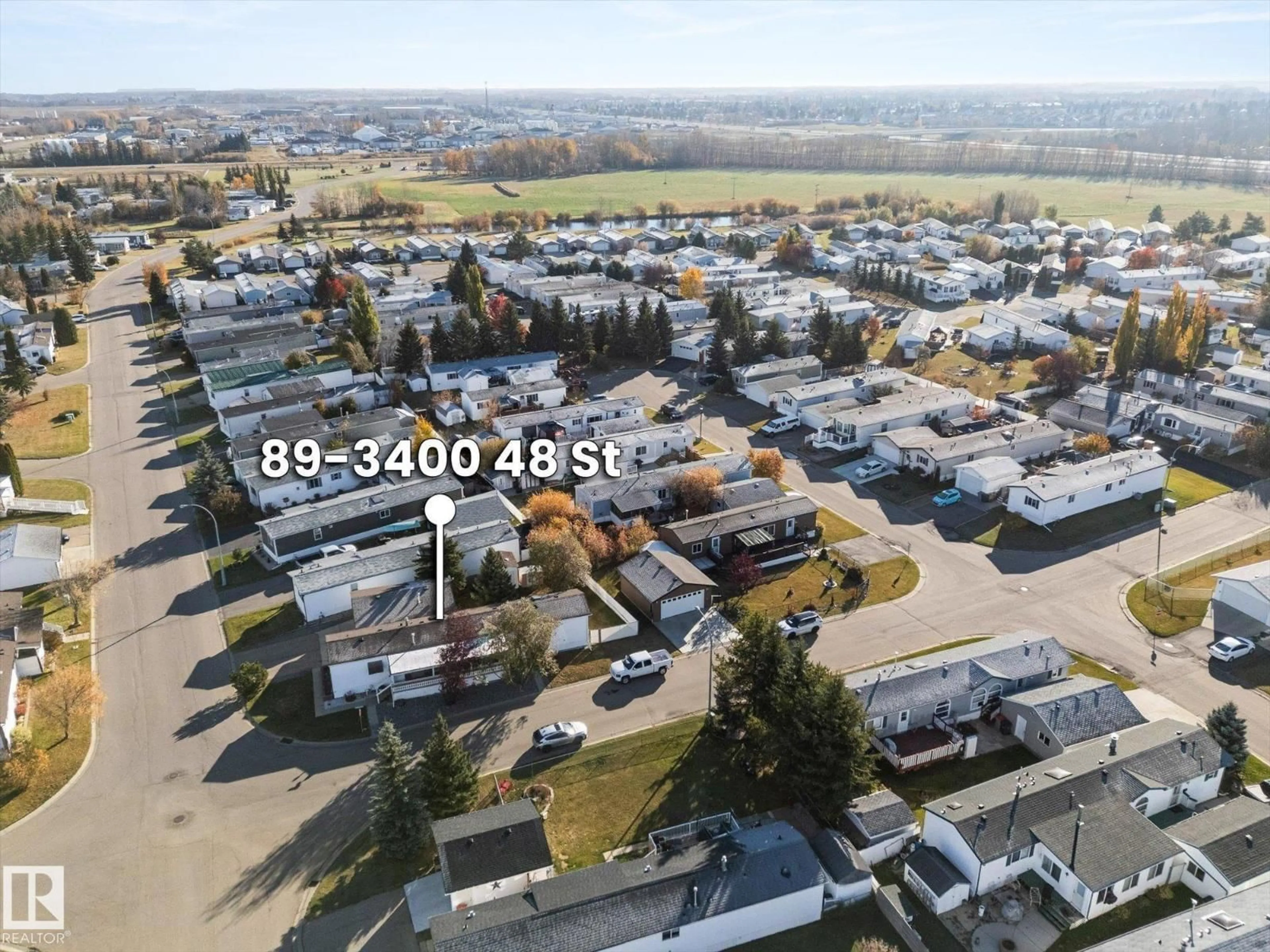 A pic from outside/outdoor area/front of a property/back of a property/a pic from drone, street for 89 3400 48 ST, Stony Plain Alberta T7Z1C1