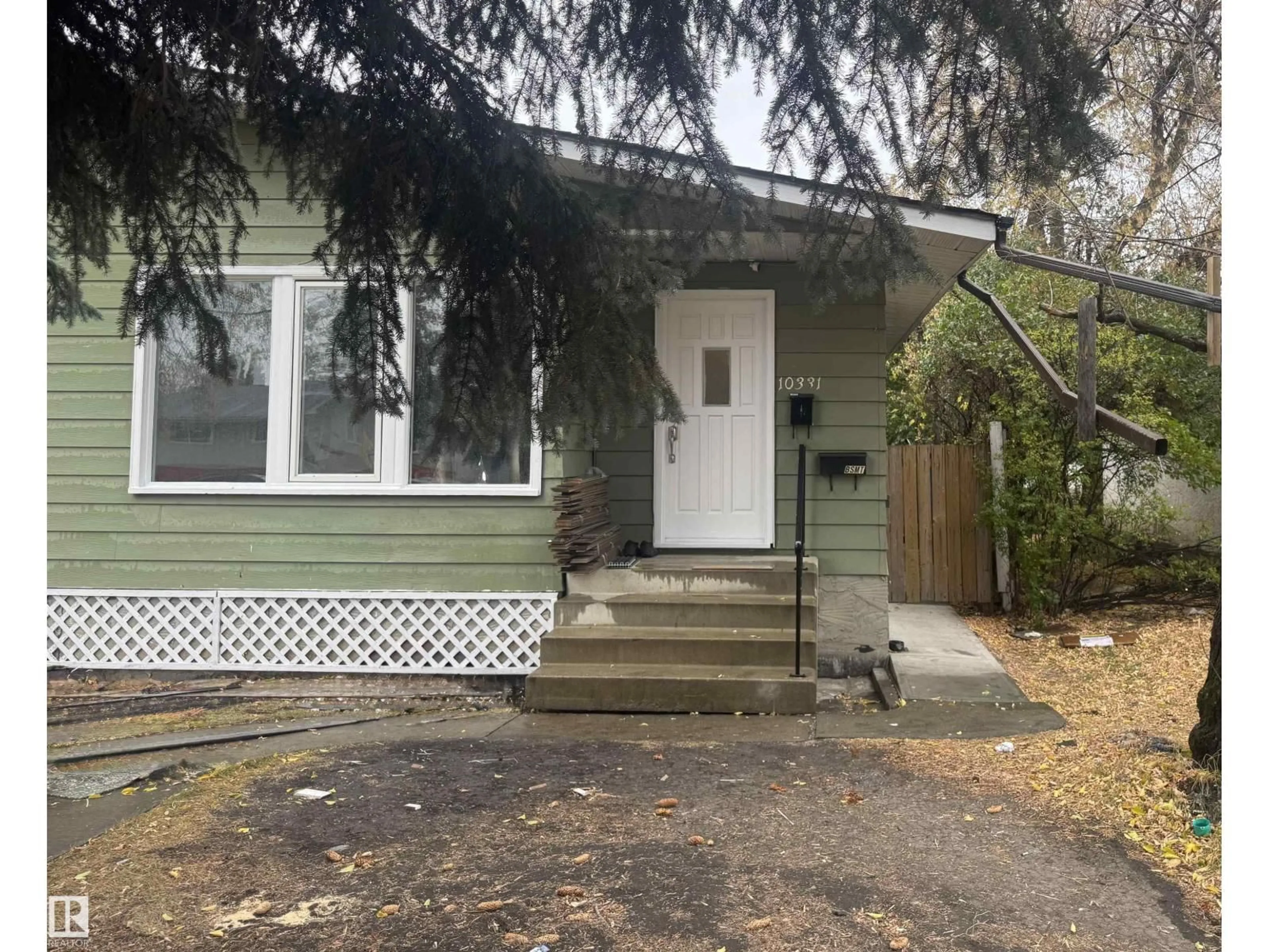 Home with vinyl exterior material, street for NW - 10331 153 ST, Edmonton Alberta T5P2B7