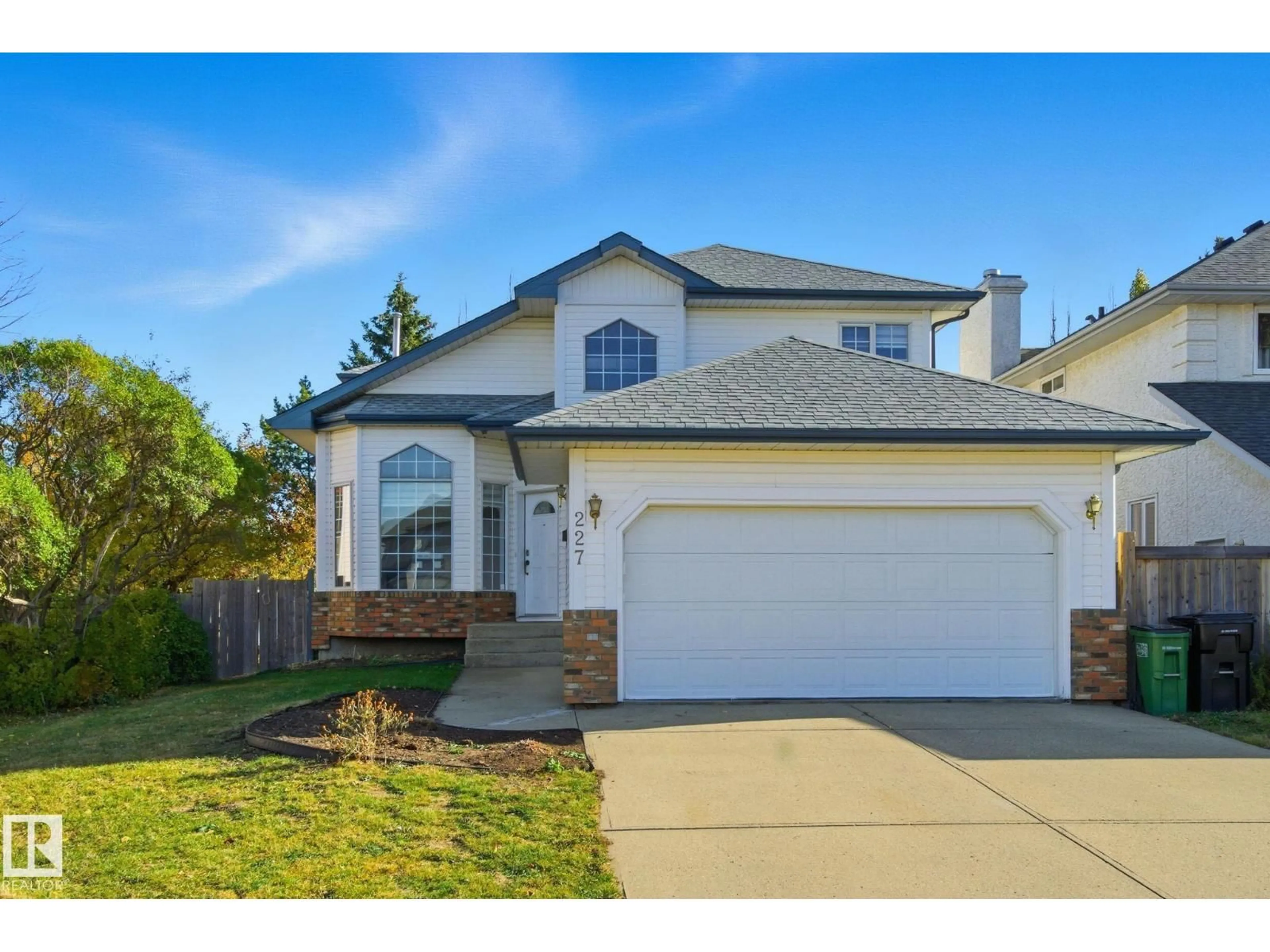 Home with vinyl exterior material, street for 227 PETER CL NW, Edmonton Alberta T5T5Y5