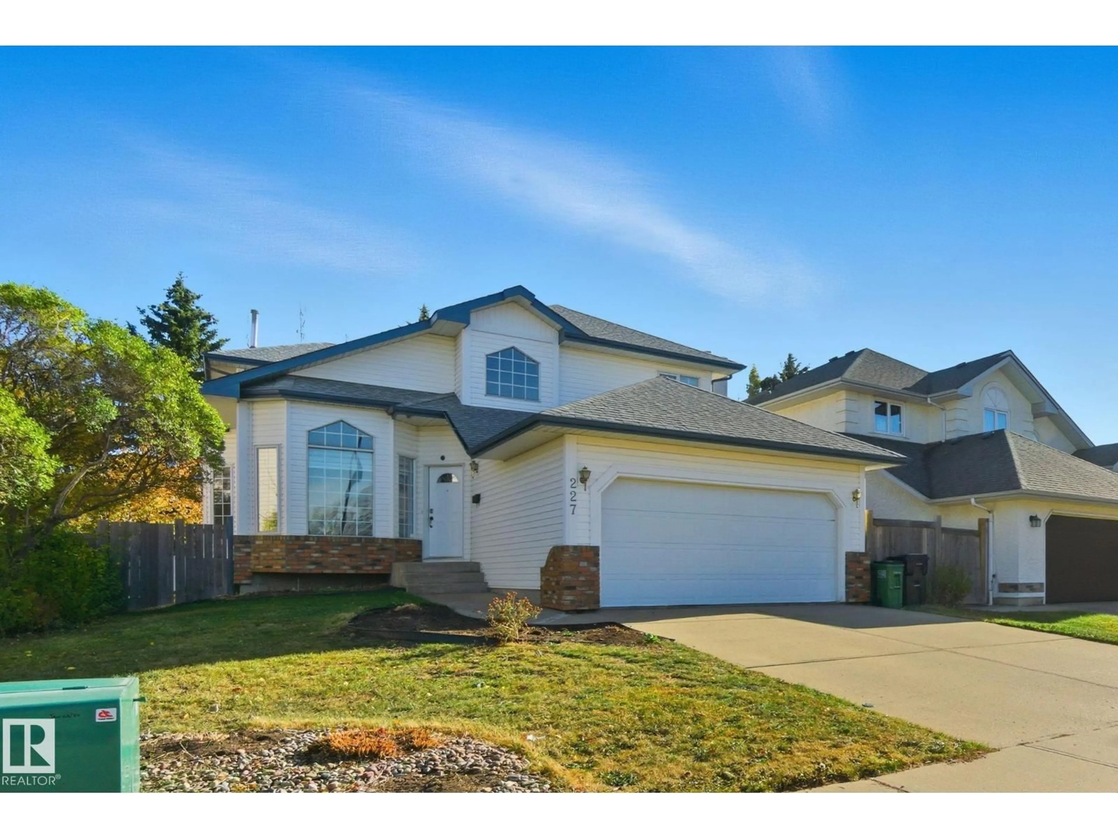 Home with vinyl exterior material, street for 227 PETER CL NW, Edmonton Alberta T5T5Y5