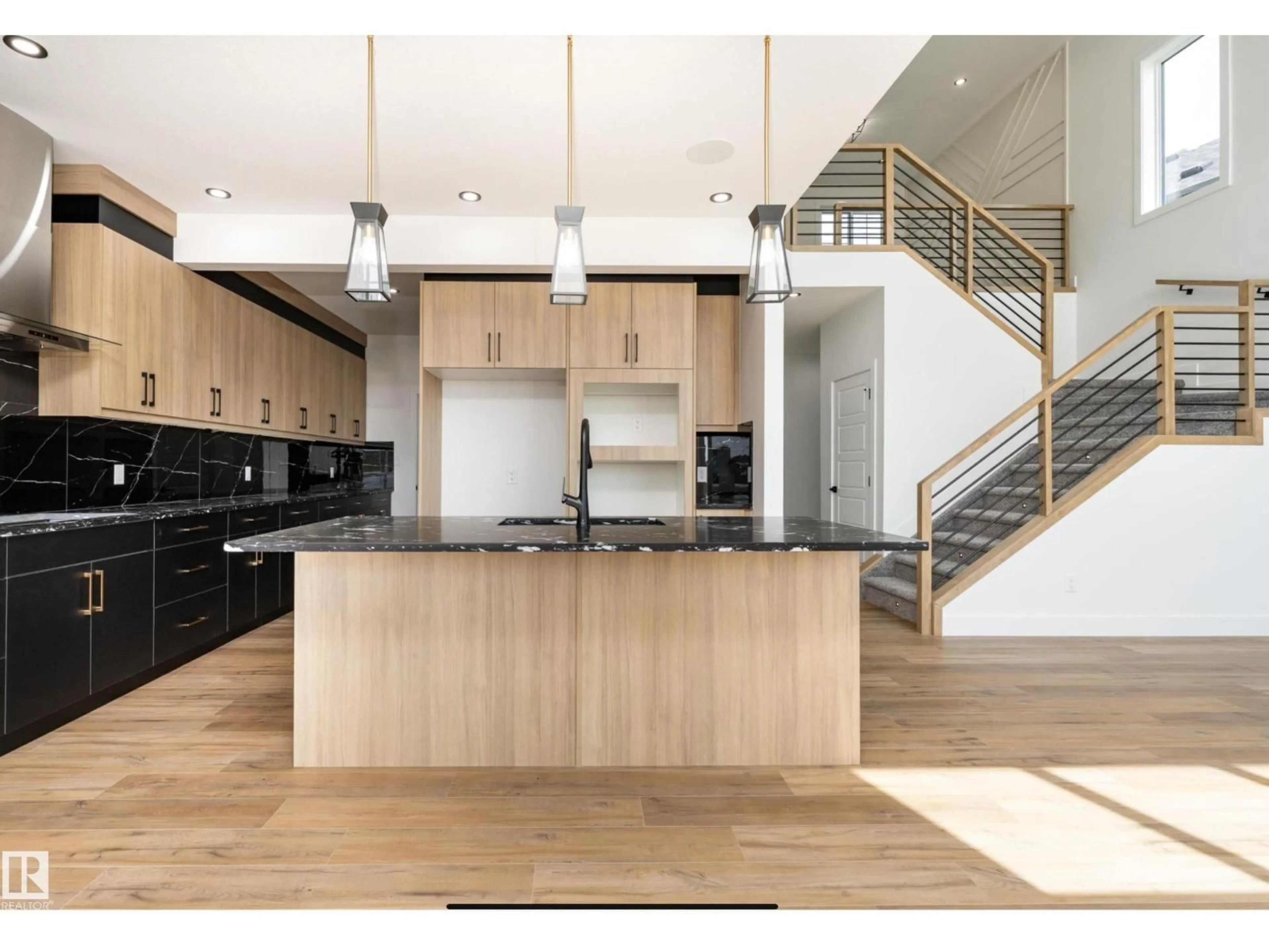 Open concept kitchen, wood/laminate floor for 95 EDGEFIELD WY, St. Albert Alberta T8N7Z9