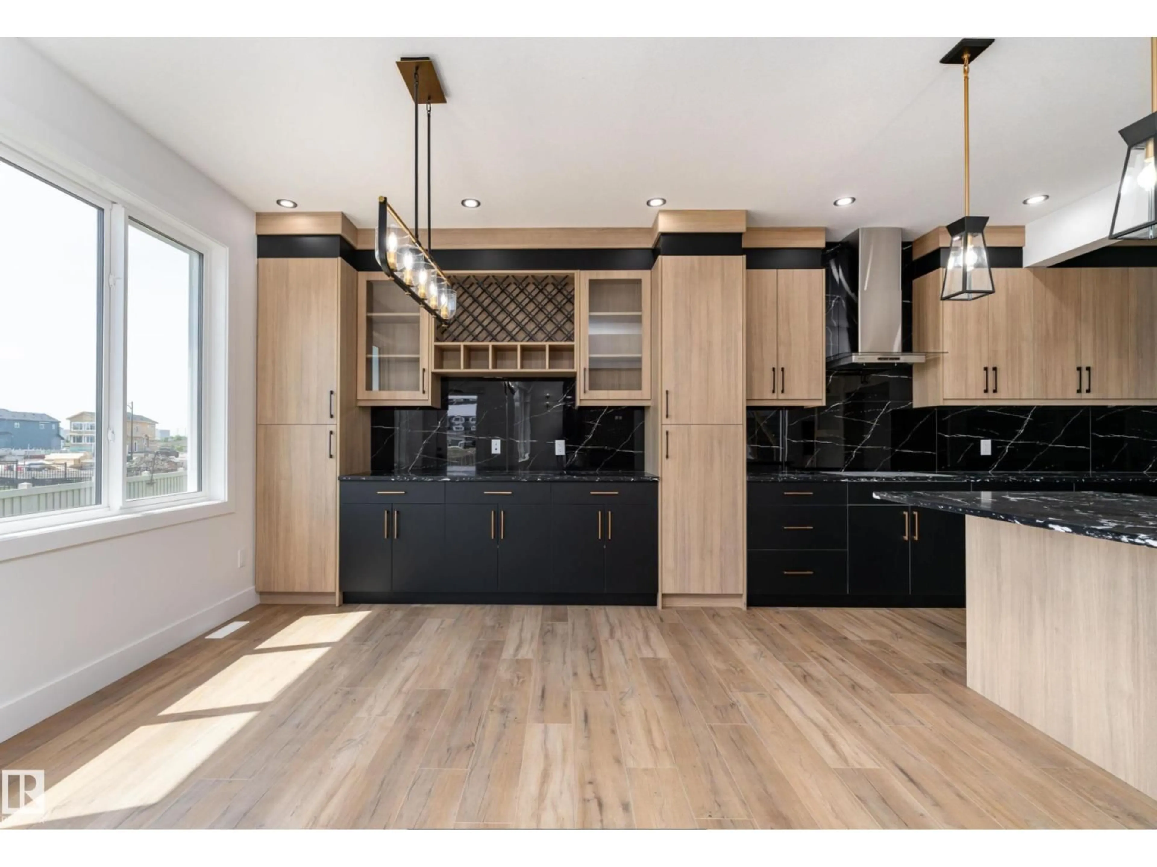Open concept kitchen, wood/laminate floor for 95 EDGEFIELD WY, St. Albert Alberta T8N7Z9