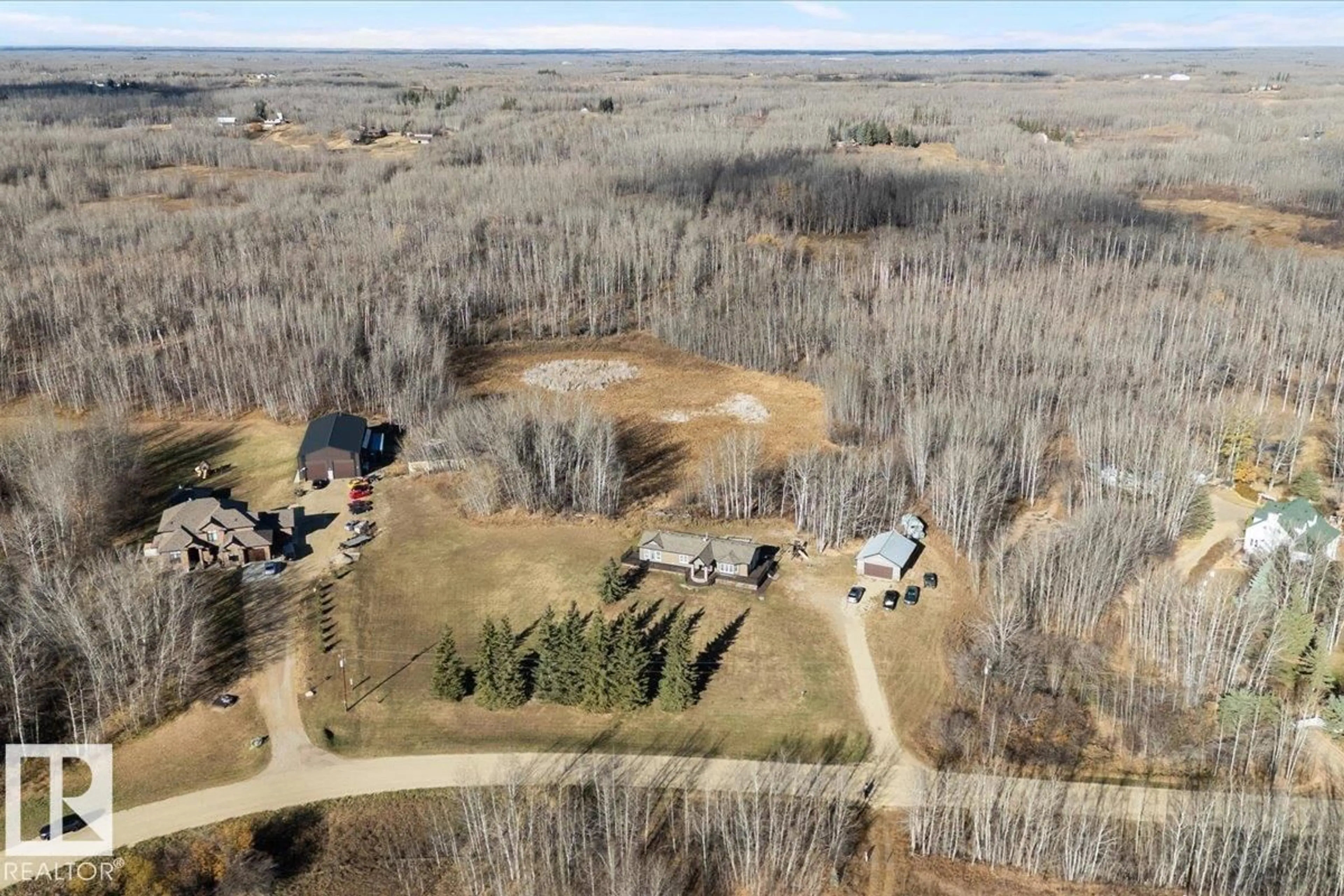 A pic from outside/outdoor area/front of a property/back of a property/a pic from drone, forest/trees view for 121 - 50514 RANGE ROAD 202, Rural Beaver County Alberta T0B4J2