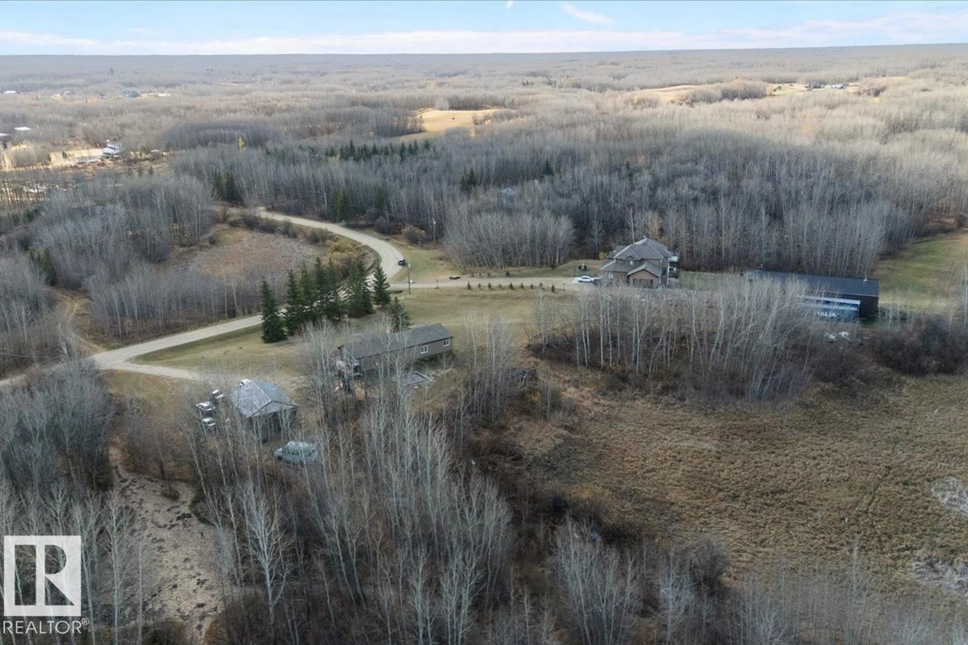 A pic from outside/outdoor area/front of a property/back of a property/a pic from drone, forest/trees view for 121 - 50514 RANGE ROAD 202, Rural Beaver County Alberta T0B4J2