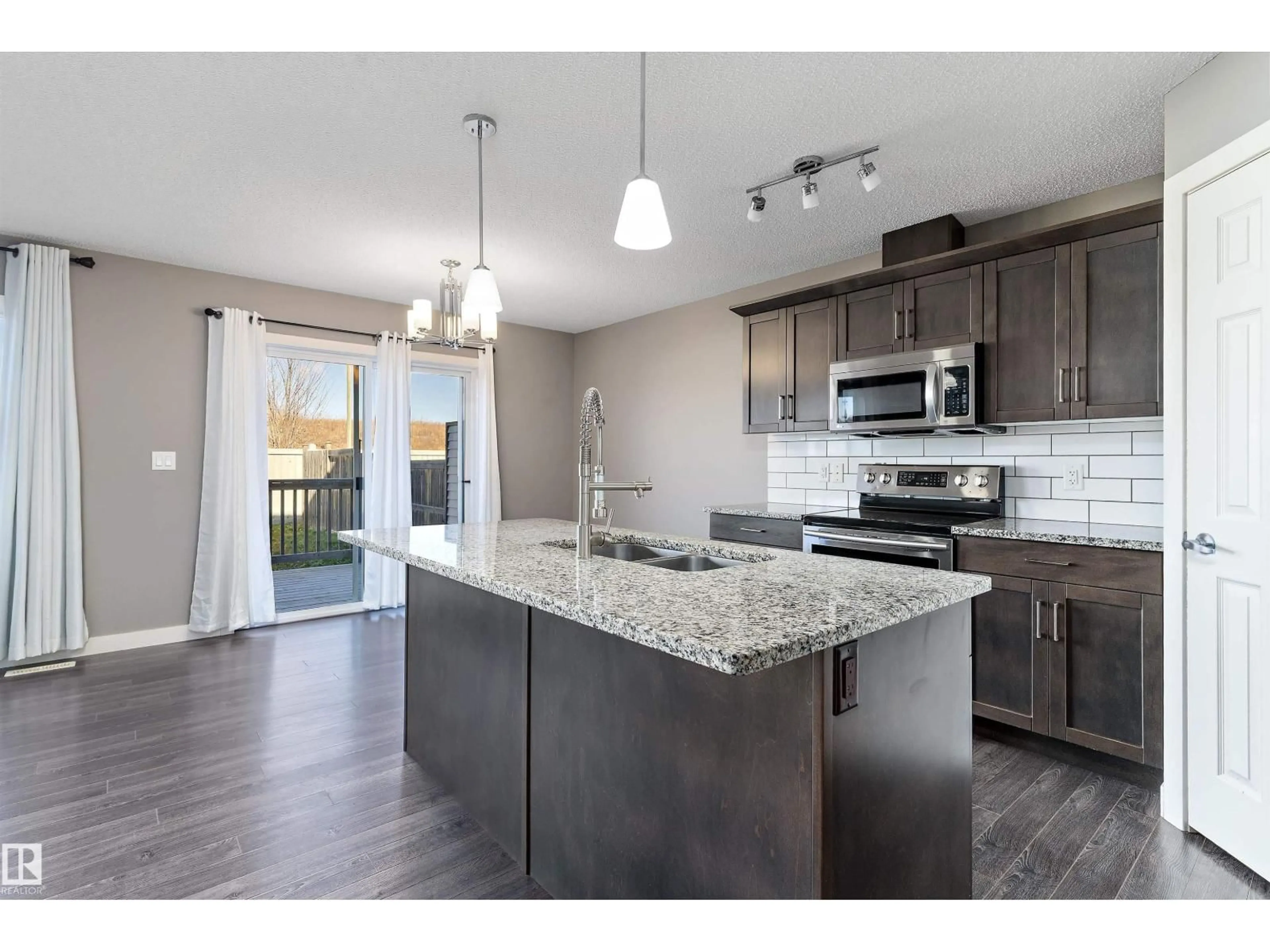 Open concept kitchen, unknown for 3520 49 AVENUE, Beaumont Alberta T4X2B5