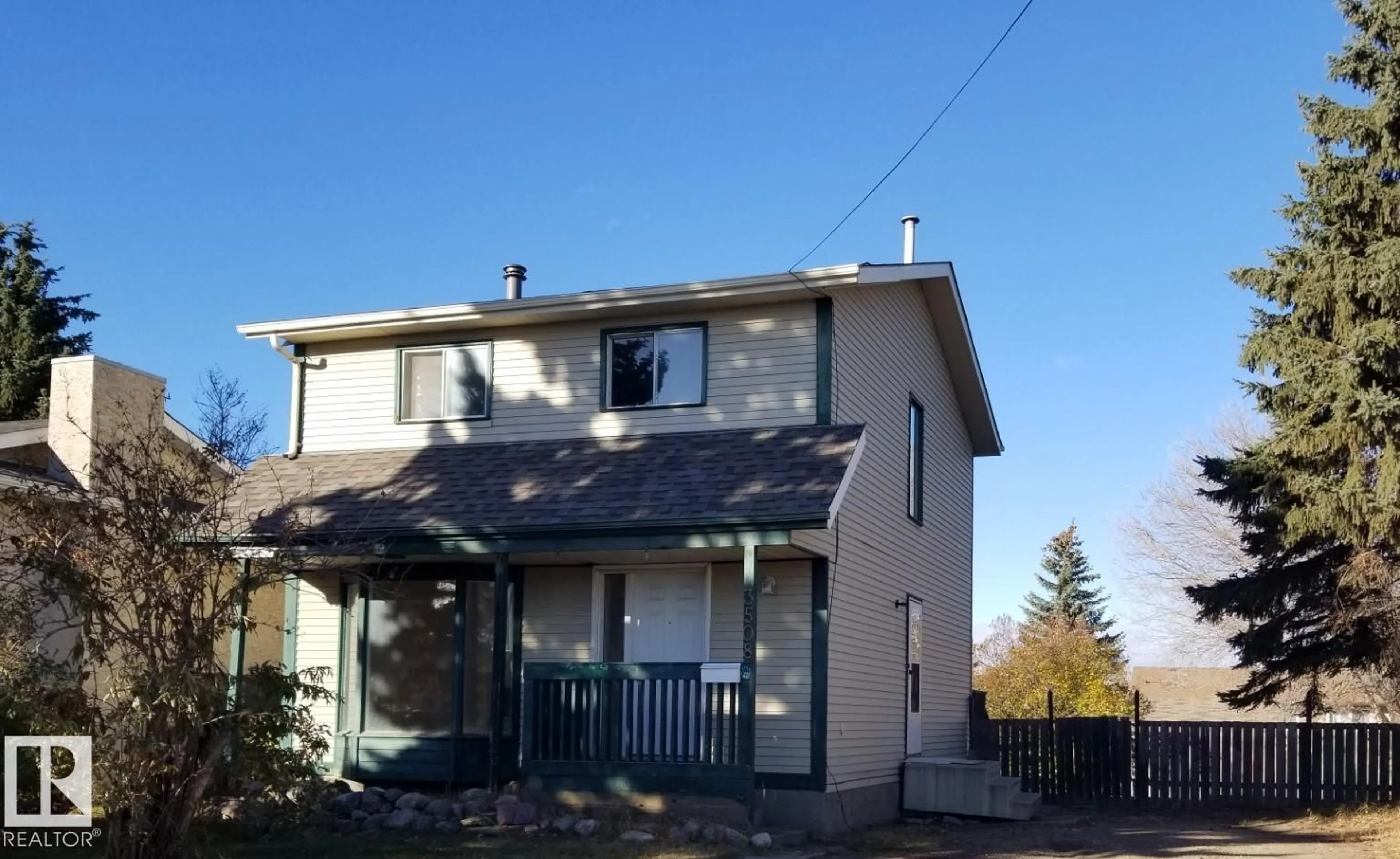 Home with vinyl exterior material, street for 3508 17B AV, Edmonton Alberta T6L2P3