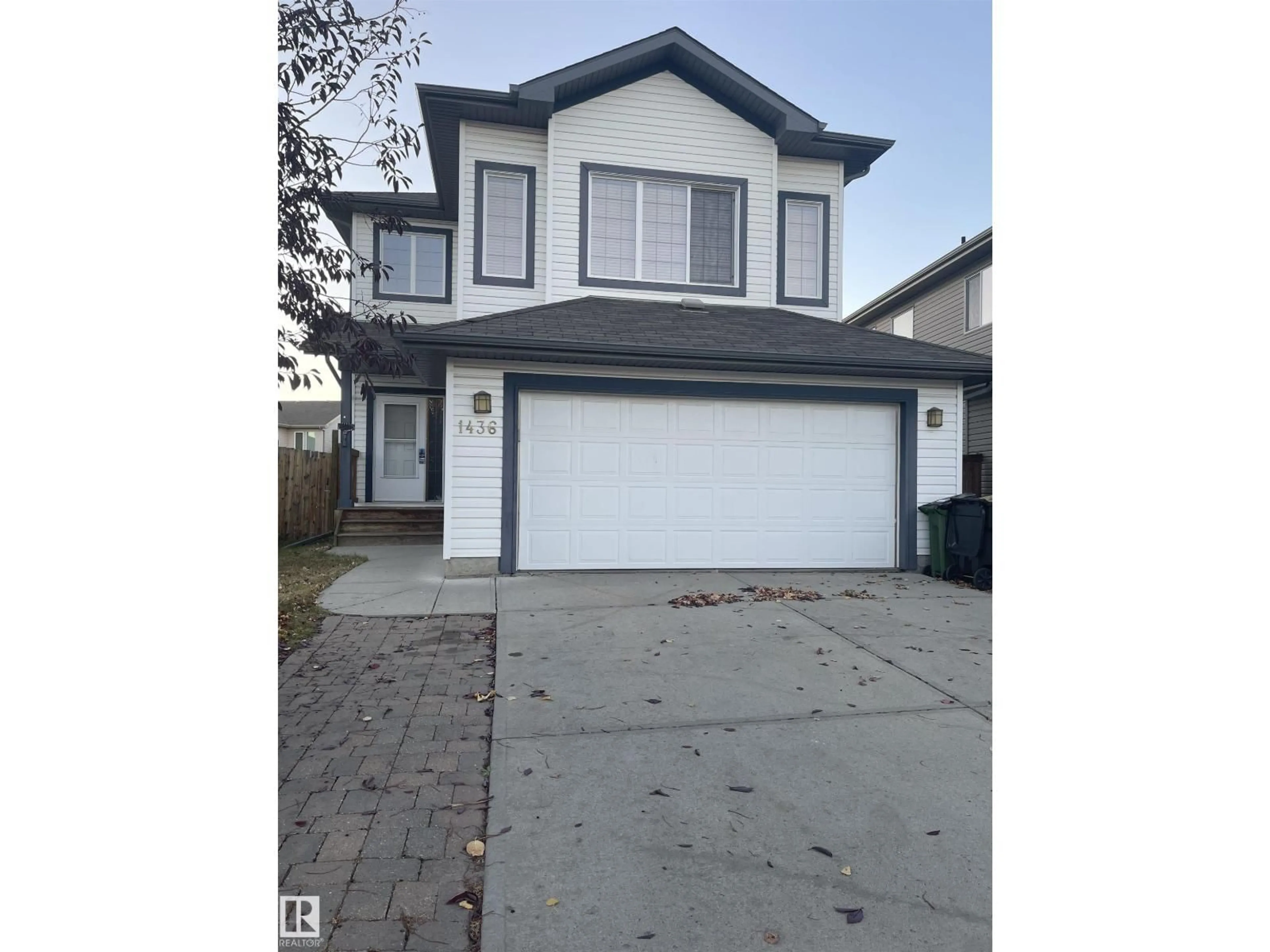 Home with vinyl exterior material, street for SW - 1436 114A ST, Edmonton Alberta T6W0N3