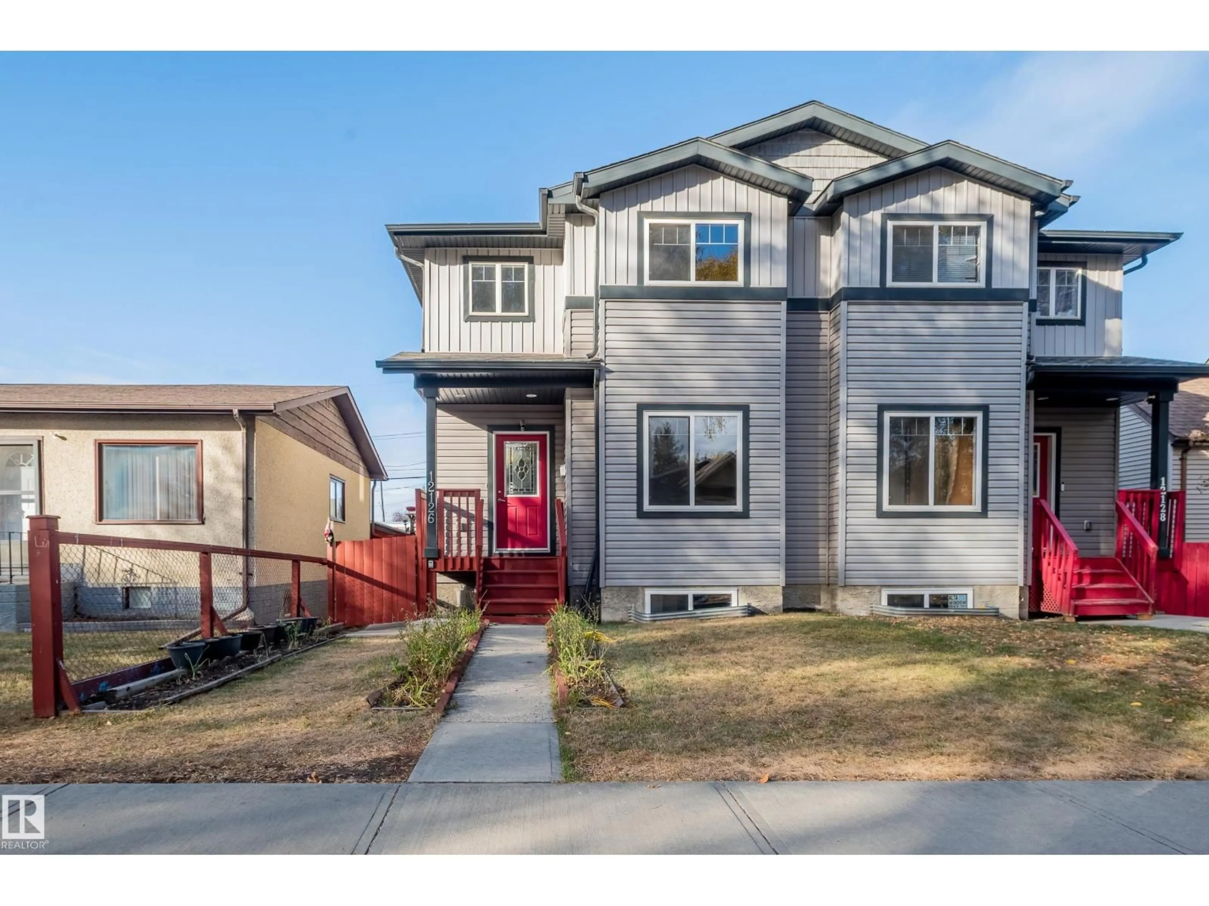 Home with vinyl exterior material, street for NW - 12126 65 ST, Edmonton Alberta T5W4L8
