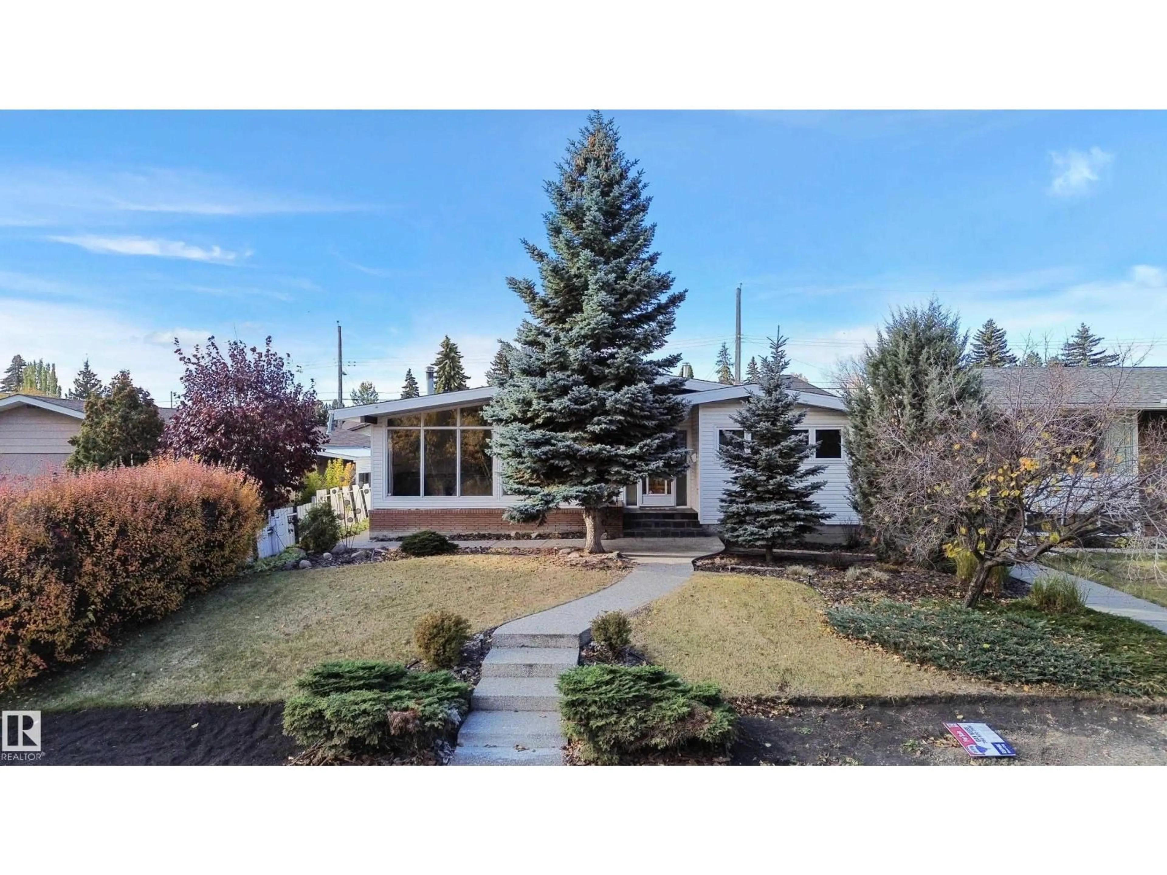 Home with vinyl exterior material, street for 9708 64 ST, Edmonton Alberta T6B1R3