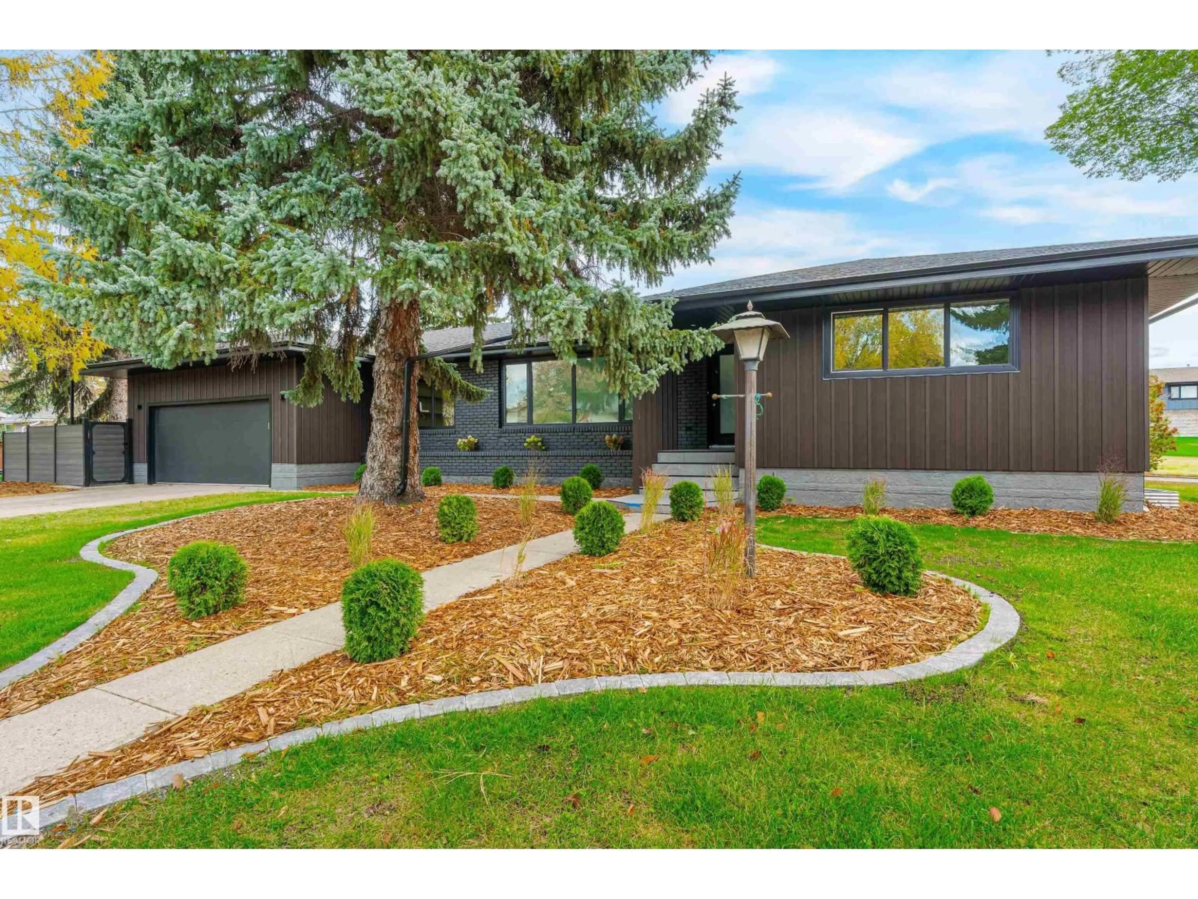 Home with vinyl exterior material, street for 4803 144 ST, Edmonton Alberta T6H4G9