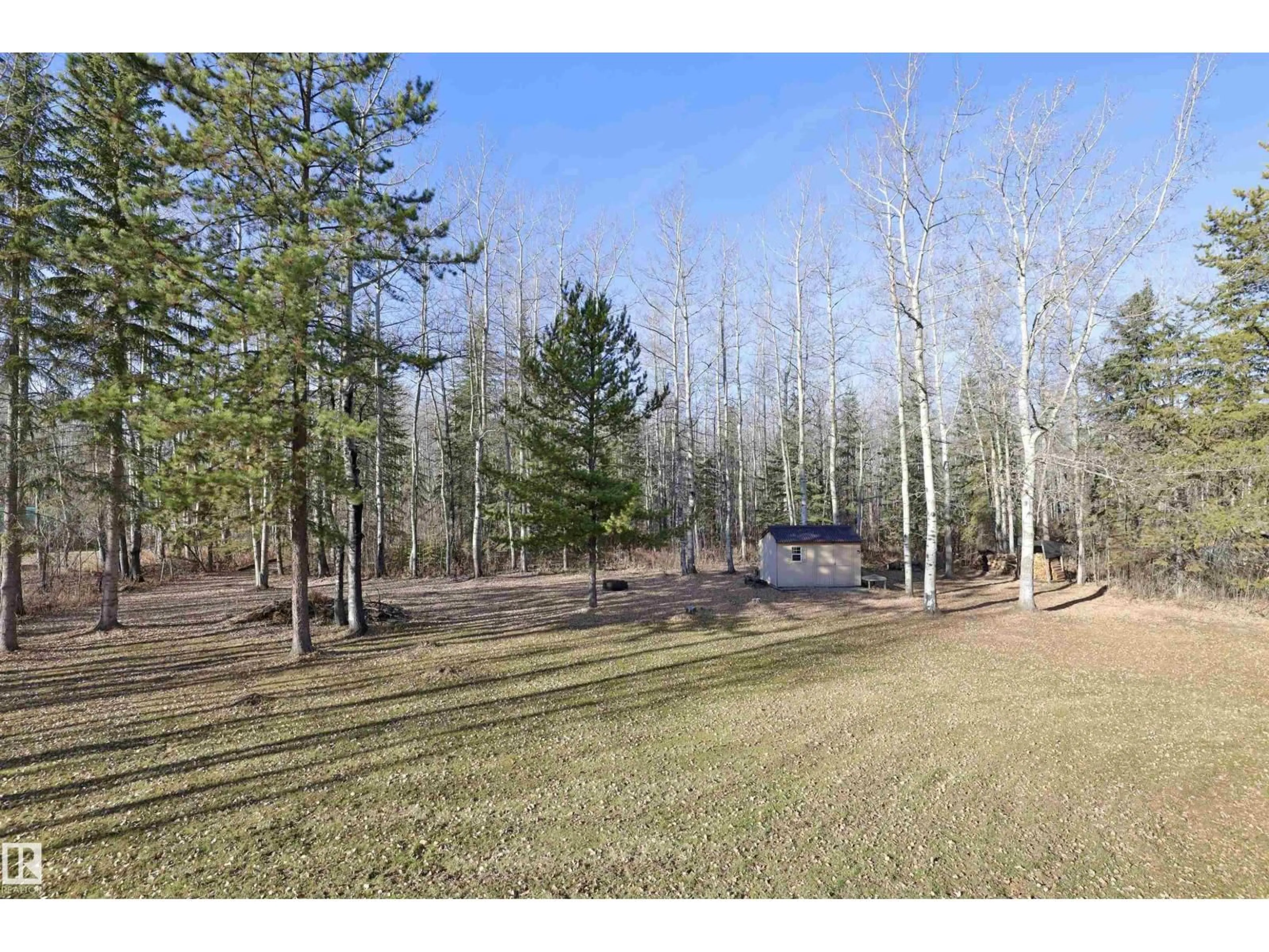 A pic from outside/outdoor area/front of a property/back of a property/a pic from drone, forest/trees view for 4351 22 ST, Rural Wetaskiwin County Alberta T0C2C0
