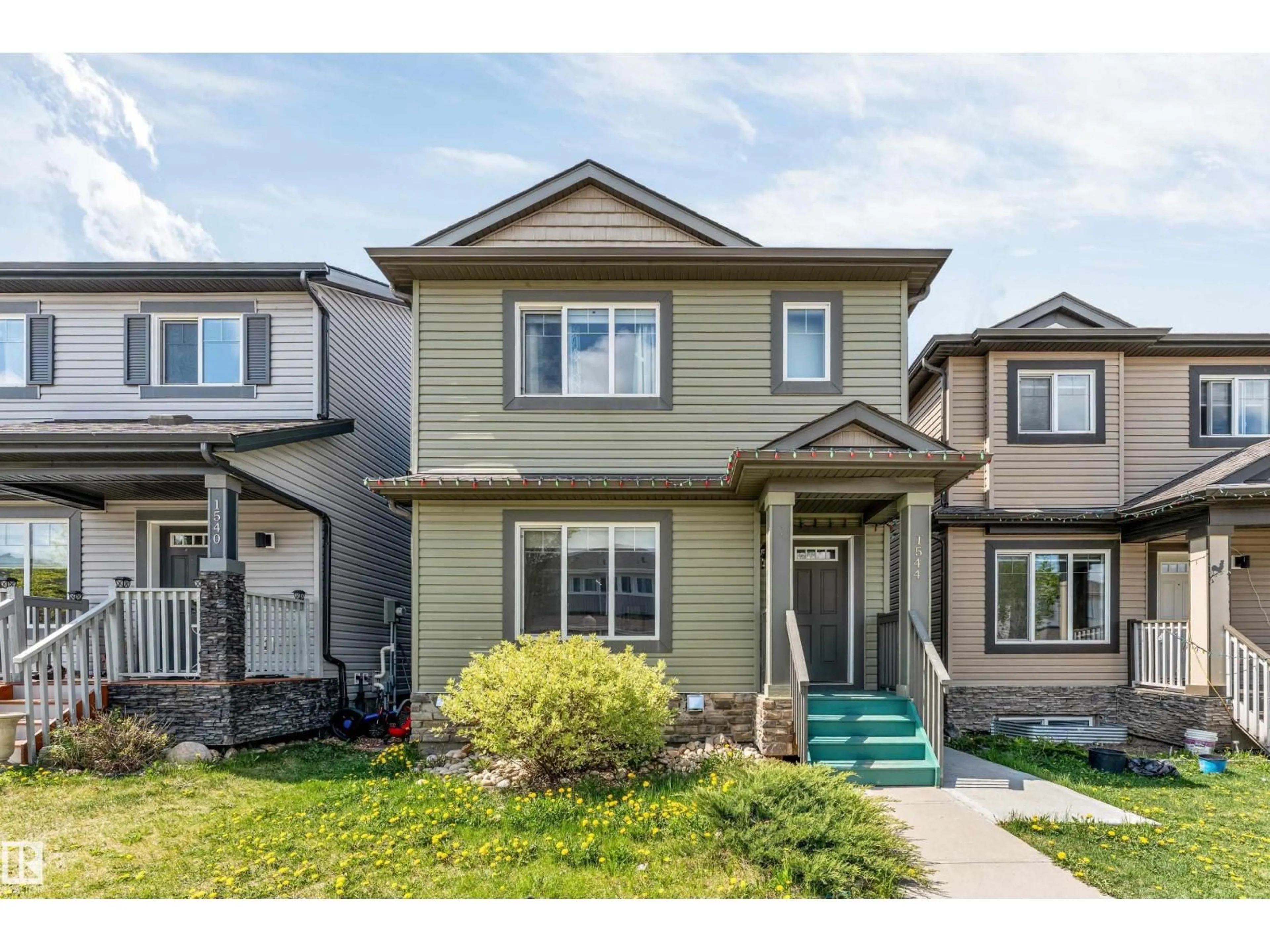 Home with vinyl exterior material, street for 1544 21 ST, Edmonton Alberta T6T2B7
