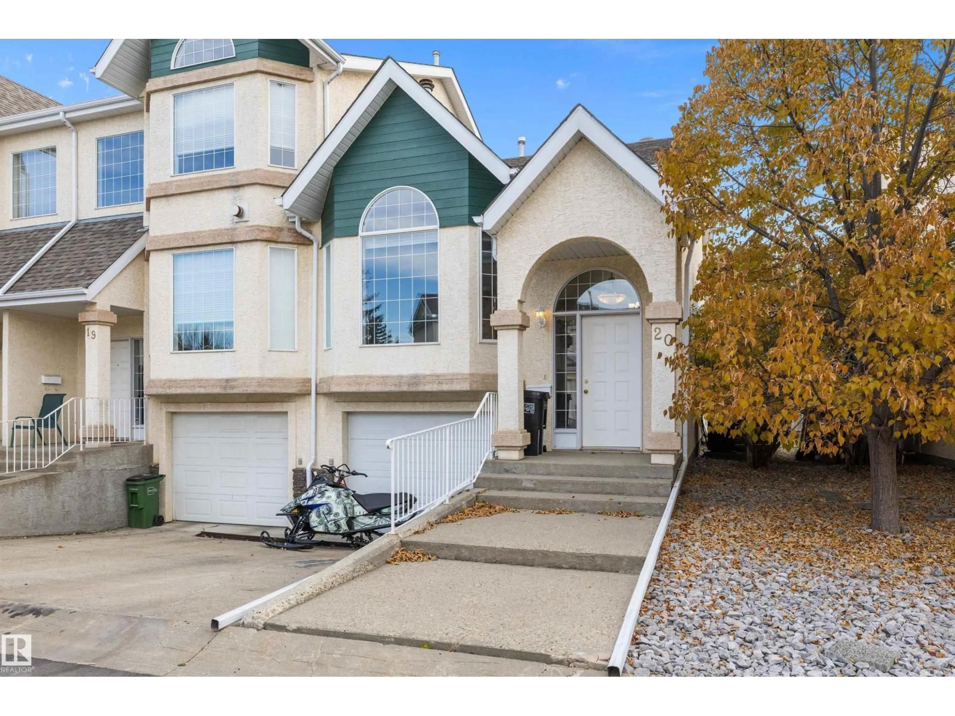 Home with vinyl exterior material, street for 20 11717 9B AV, Edmonton Alberta T6J7B7