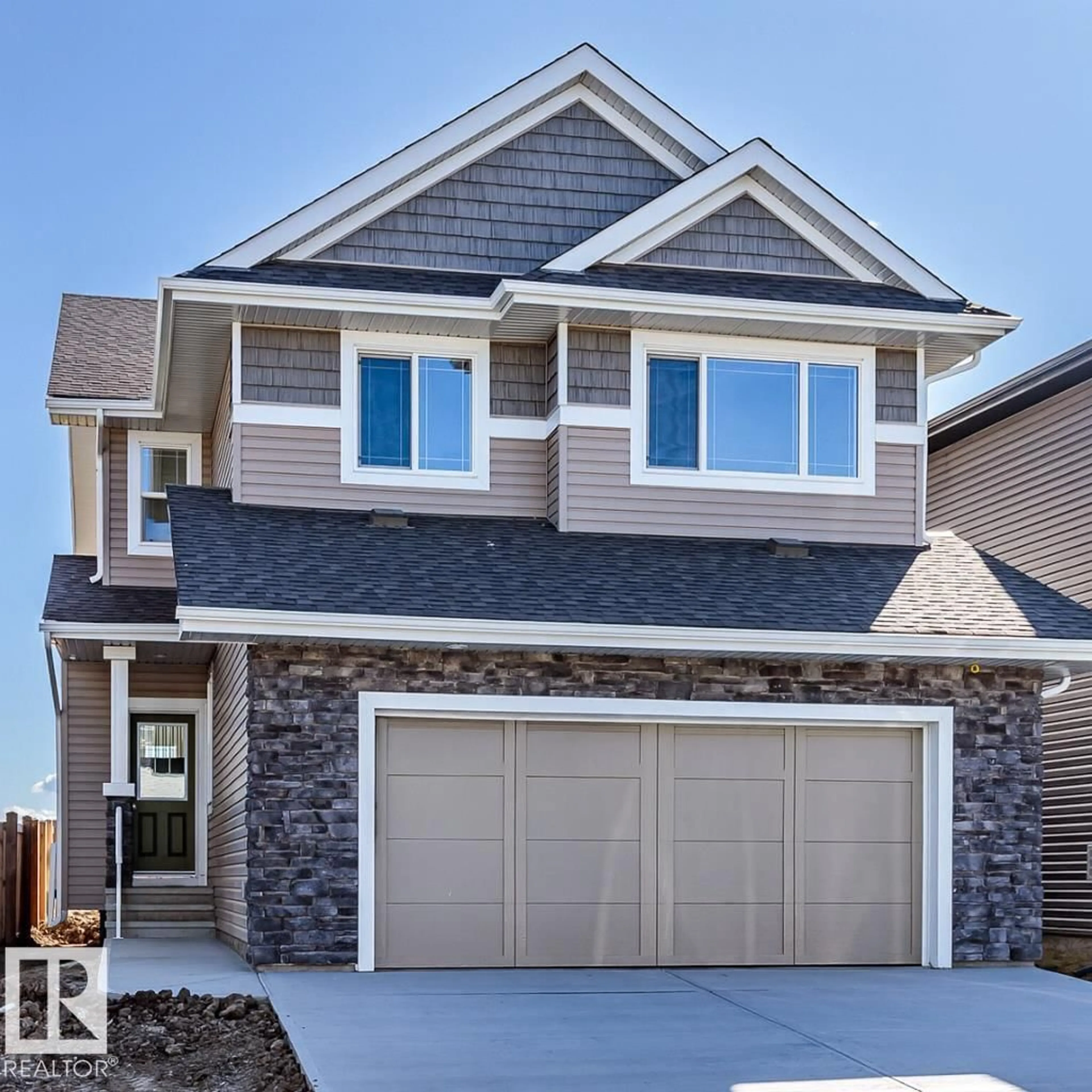 Home with vinyl exterior material, street for SW - 1603 157 ST, Edmonton Alberta T6W4J8
