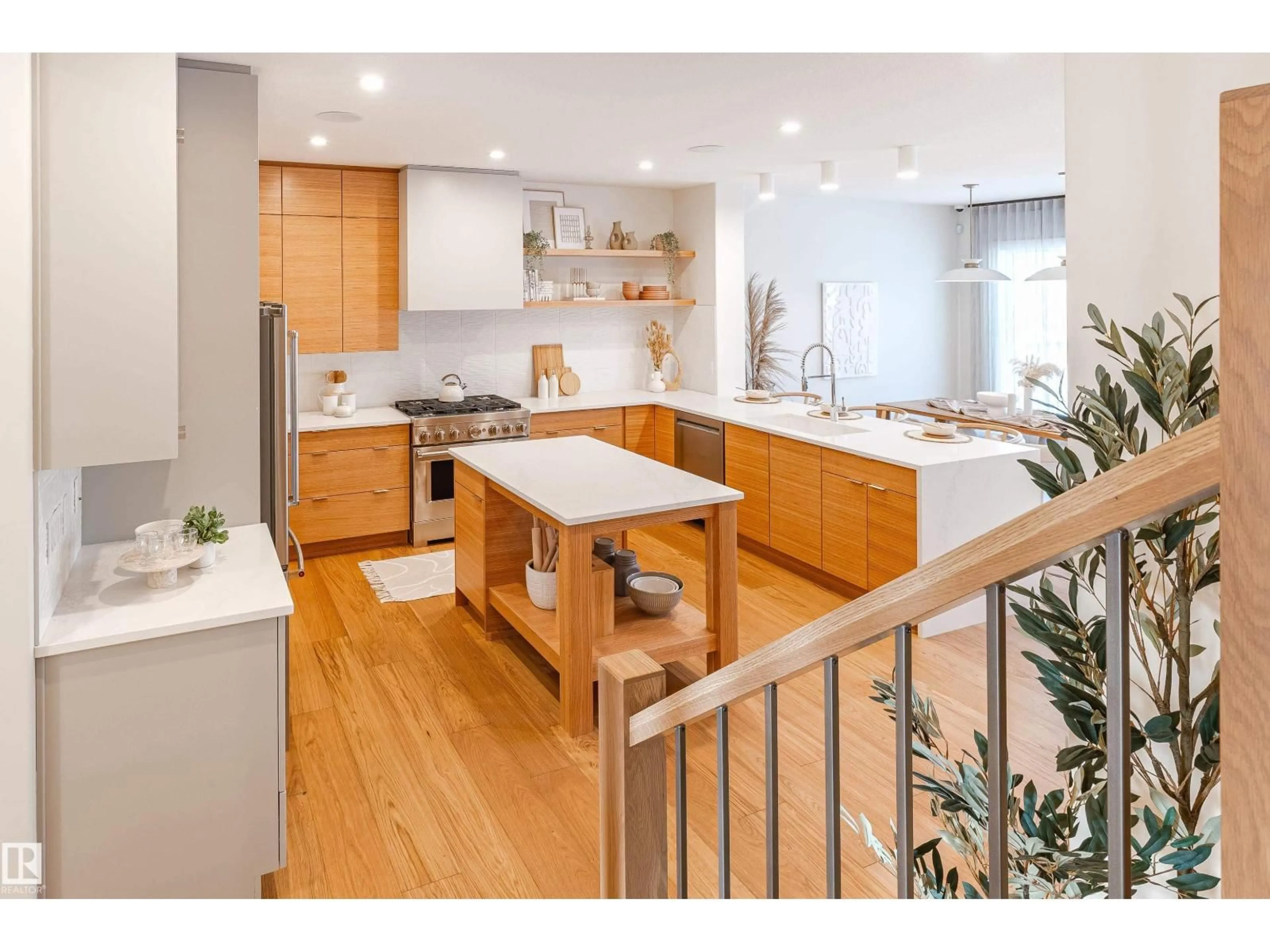 Open concept kitchen, wood/laminate floor for GR SW - 4458 KINSELLA GREEN, Edmonton Alberta T6W5G2