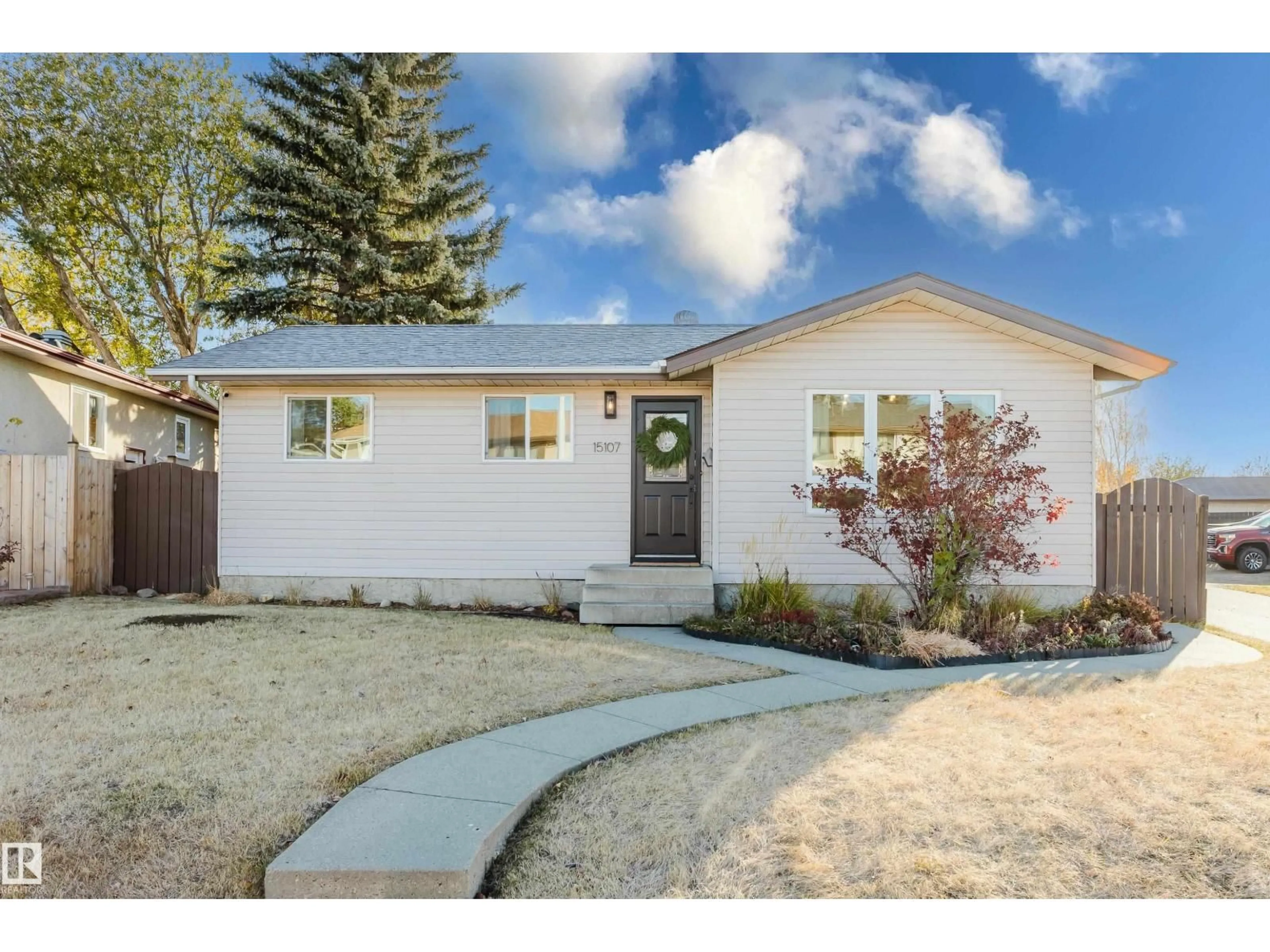 Home with vinyl exterior material, street for 15107 22 STREET, Edmonton Alberta T5Y2A4