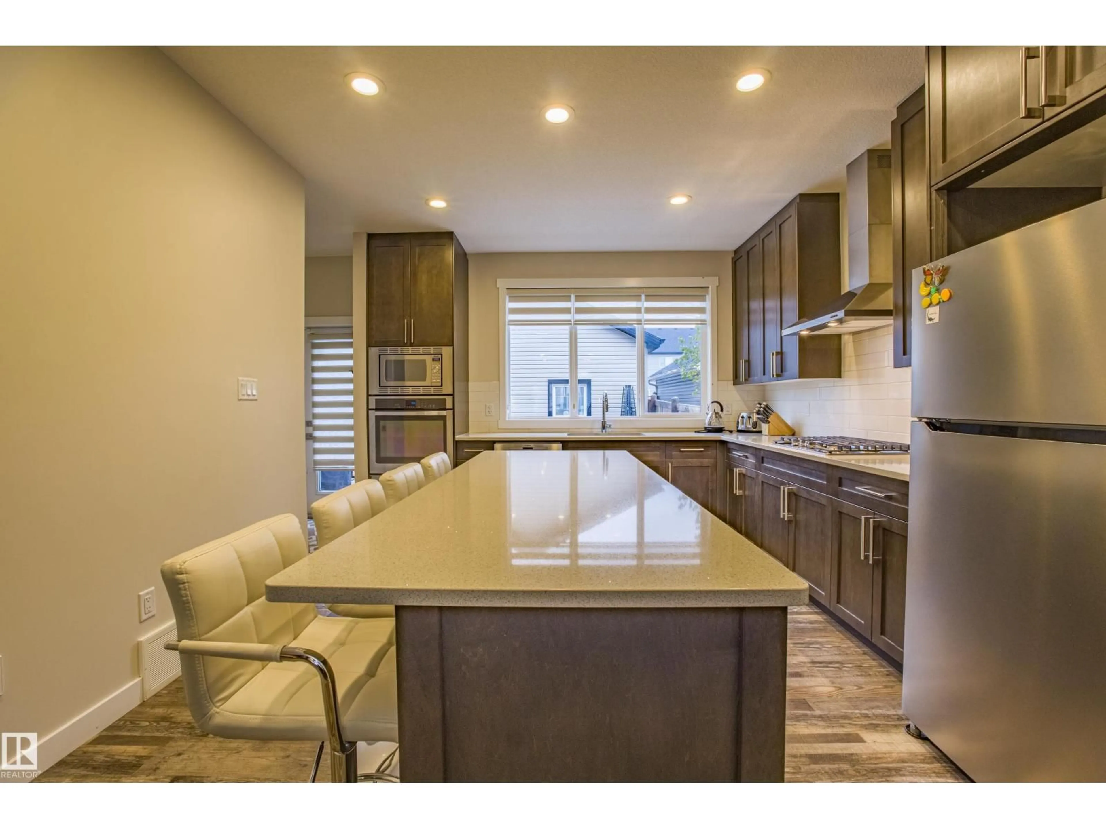 Open concept kitchen, ceramic/tile floor for 9868 206 ST NW, Edmonton Alberta T5T7L5
