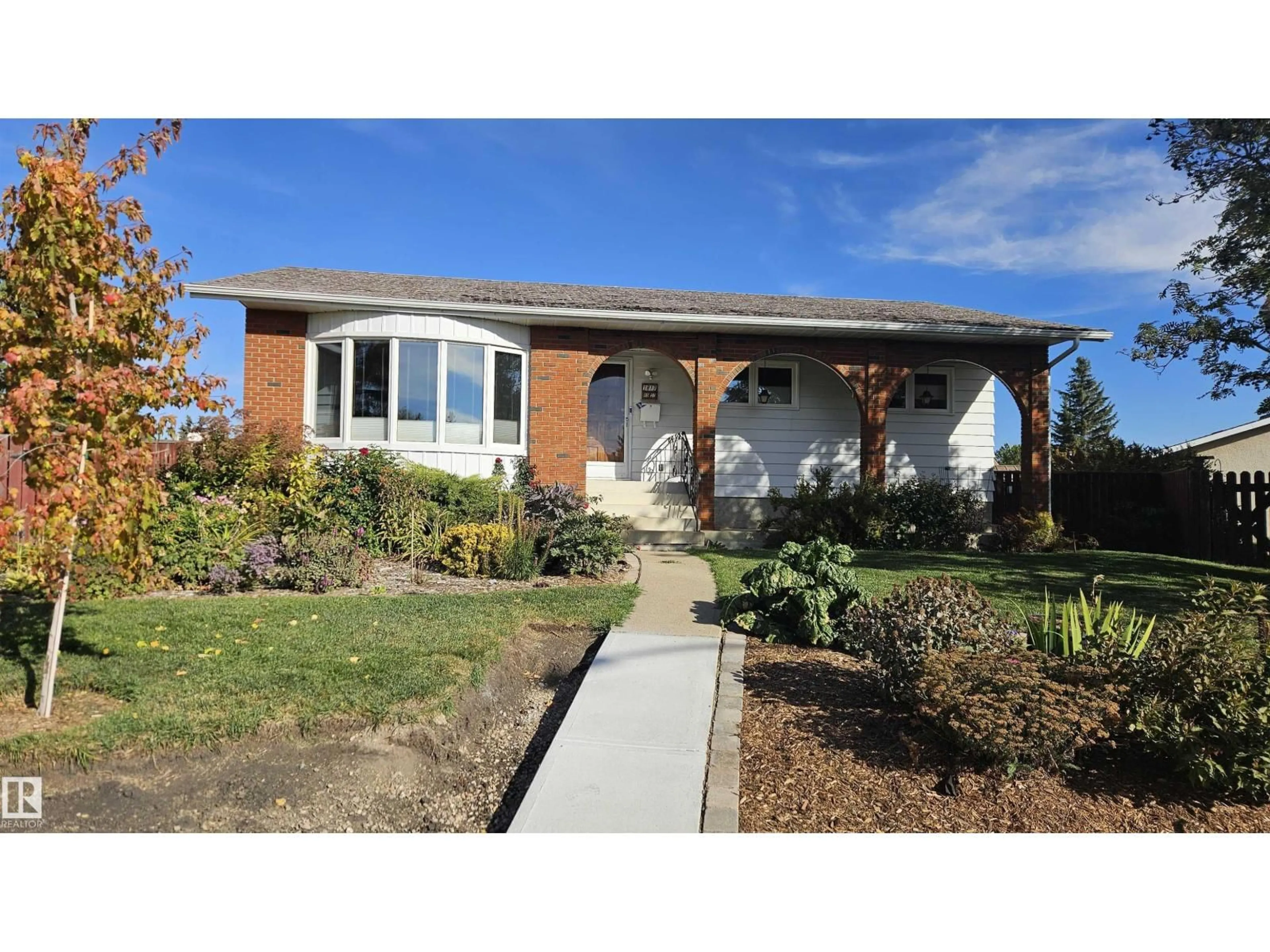 Home with vinyl exterior material, street for 1817 65 ST, Edmonton Alberta T6L1N1