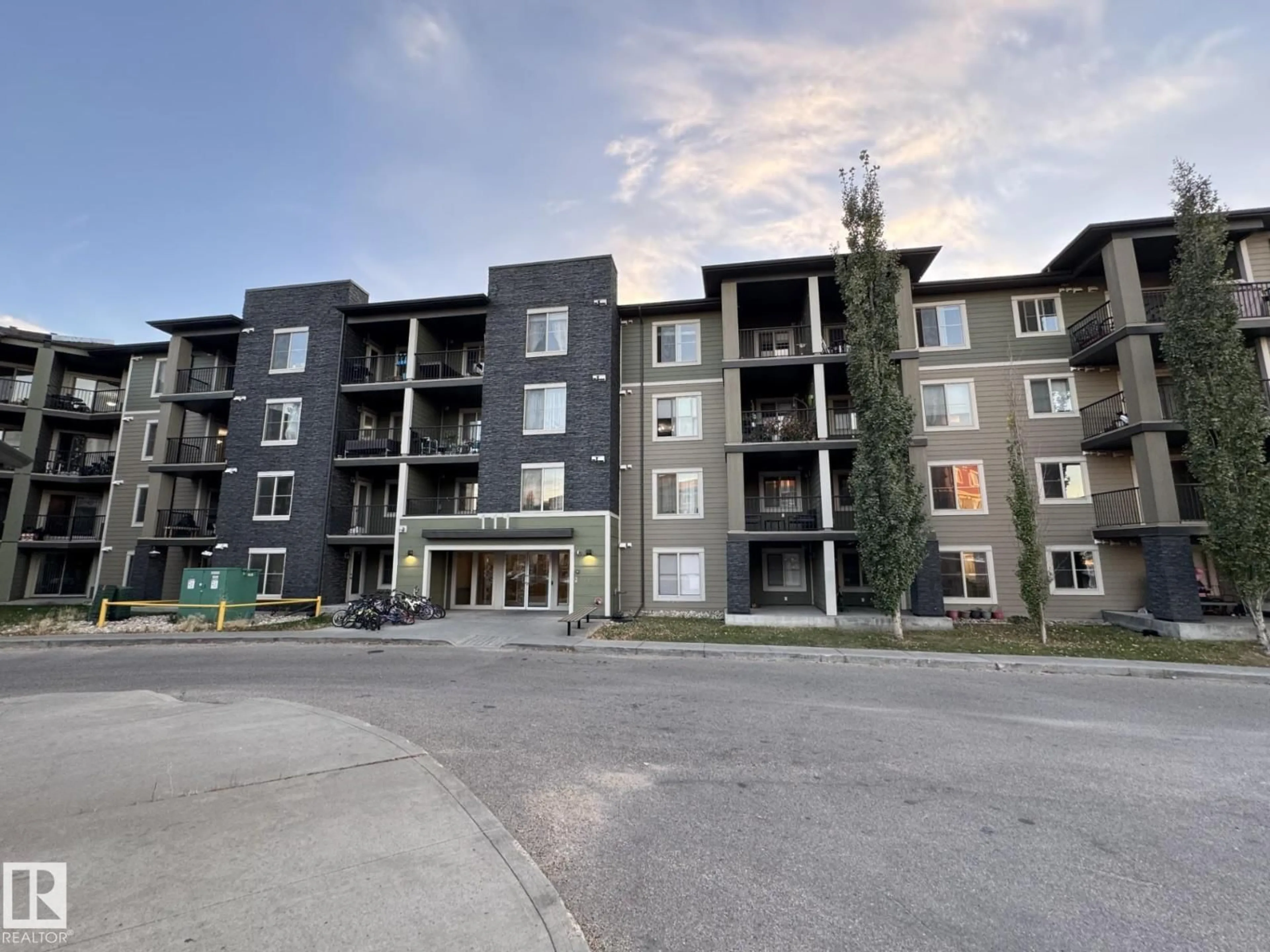 A pic from outside/outdoor area/front of a property/back of a property/a pic from drone, building for #108 - 111 WATT CM, Edmonton Alberta T6X2C6