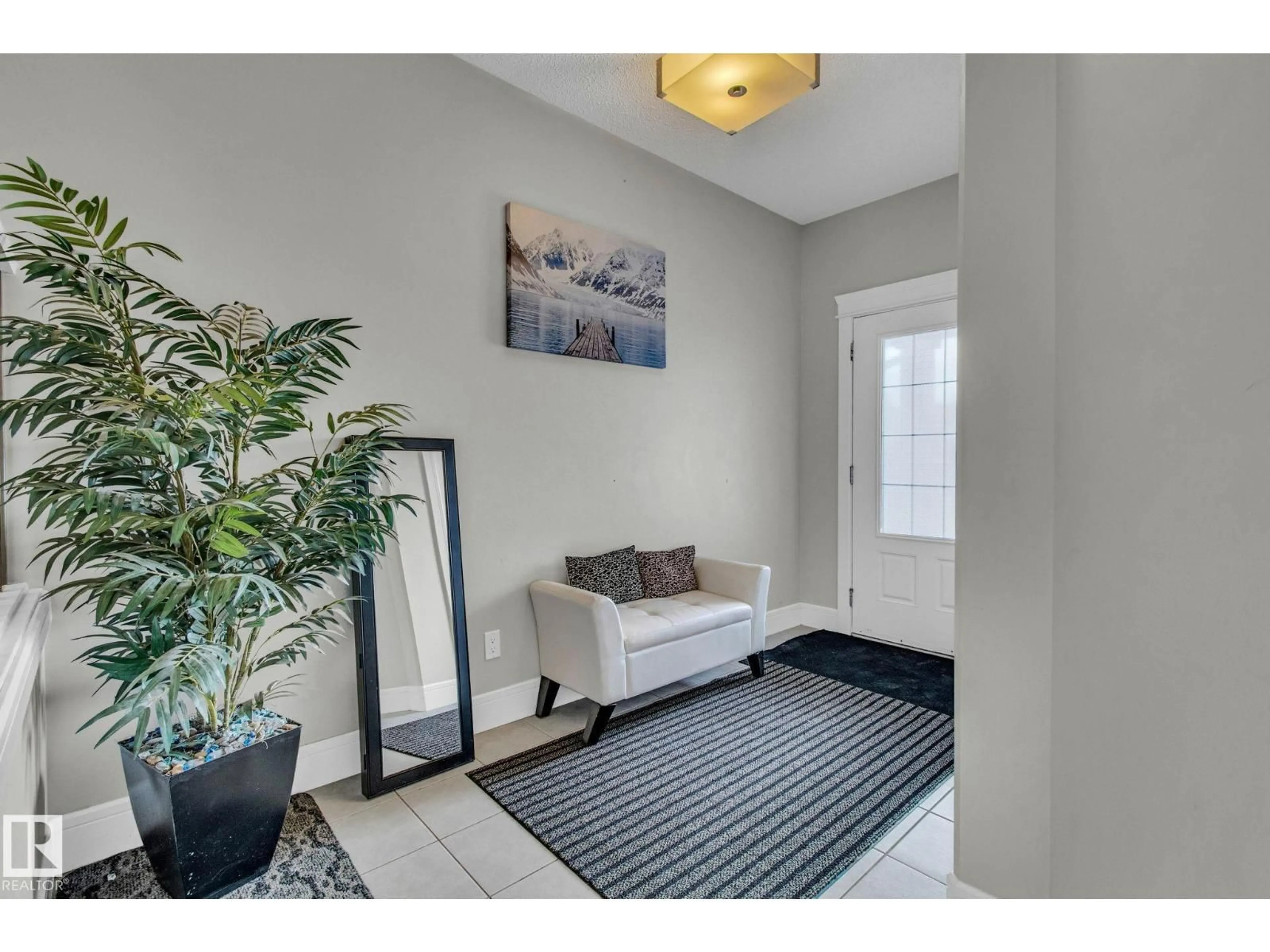 Indoor entryway for 16404 12 AV, Edmonton Alberta T6W3K4