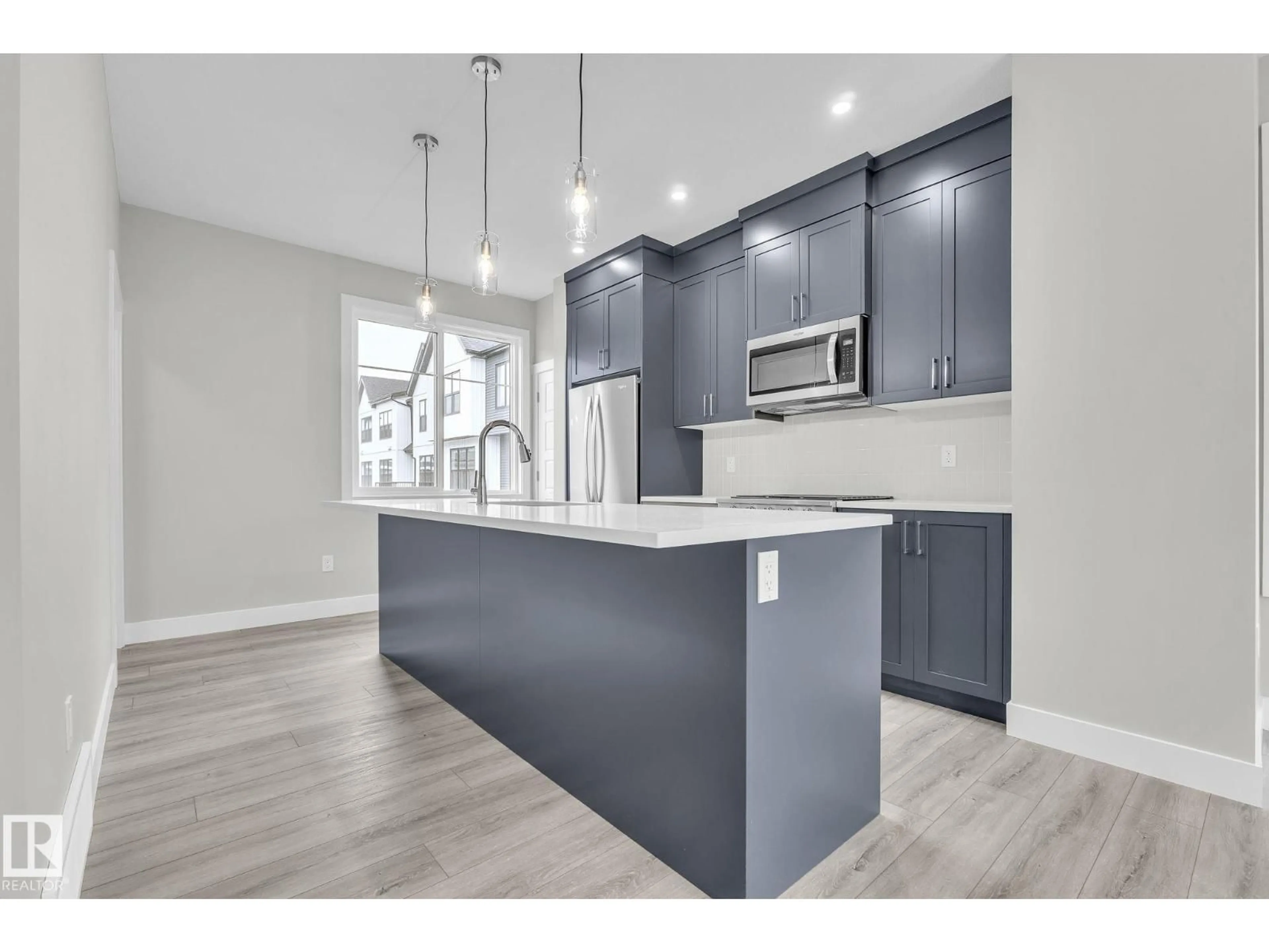 Open concept kitchen, unknown for #9 - 6905 25 AV, Edmonton Alberta T6X3B7
