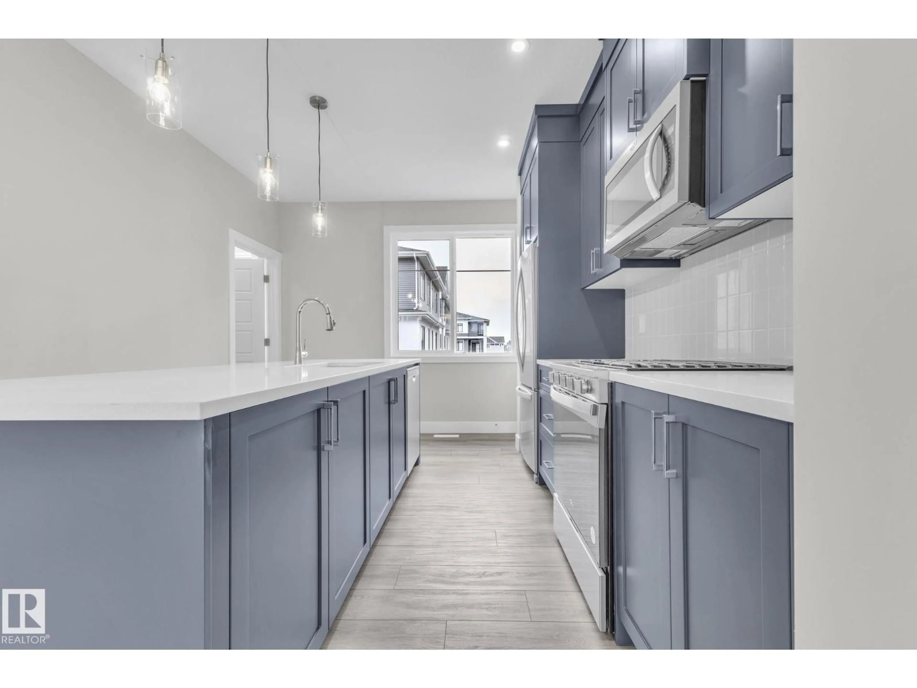 Open concept kitchen, unknown for #9 - 6905 25 AV, Edmonton Alberta T6X3B7