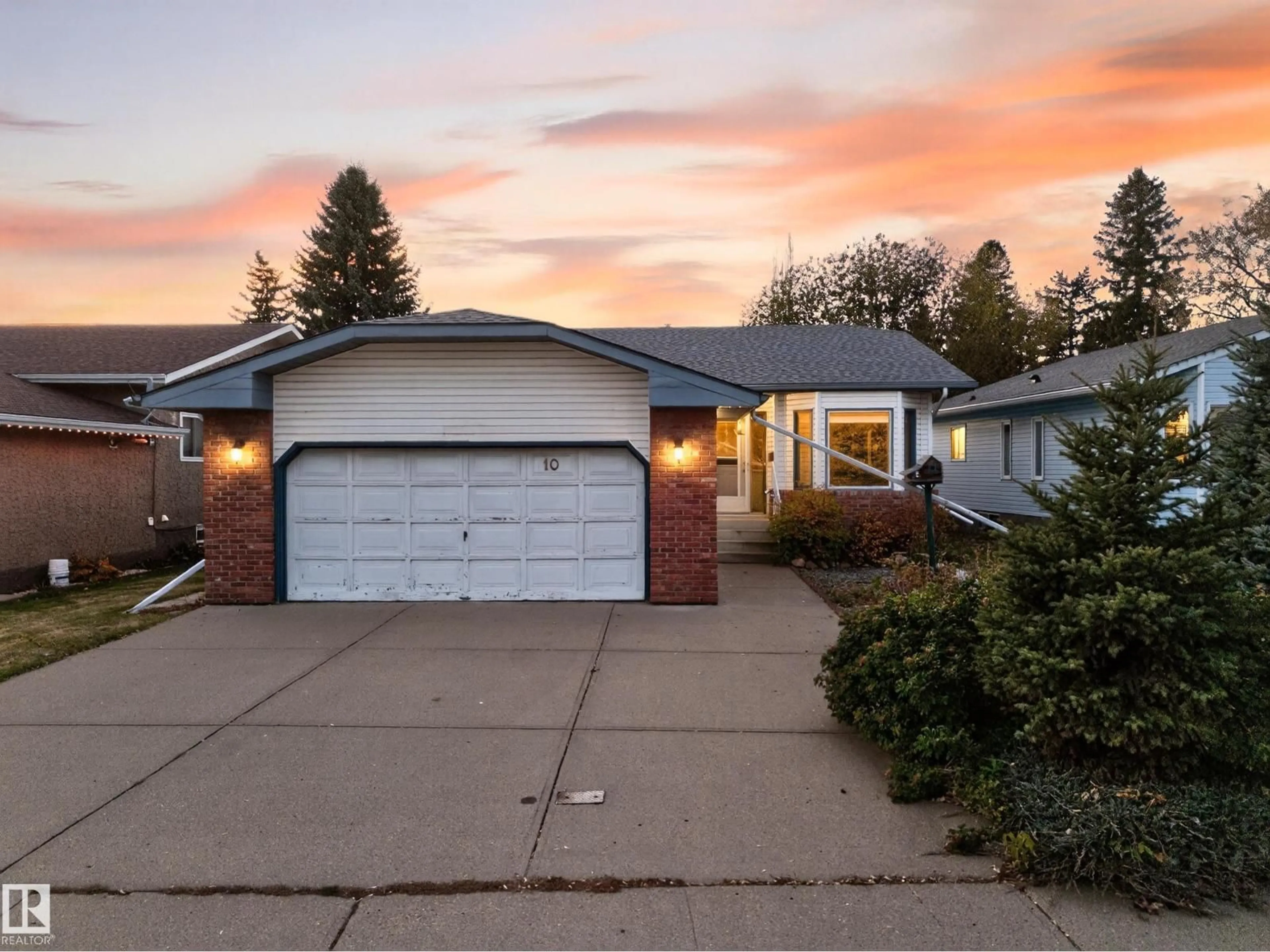 Home with vinyl exterior material, street for 10 ALTON DR, Leduc Alberta T9E6H2