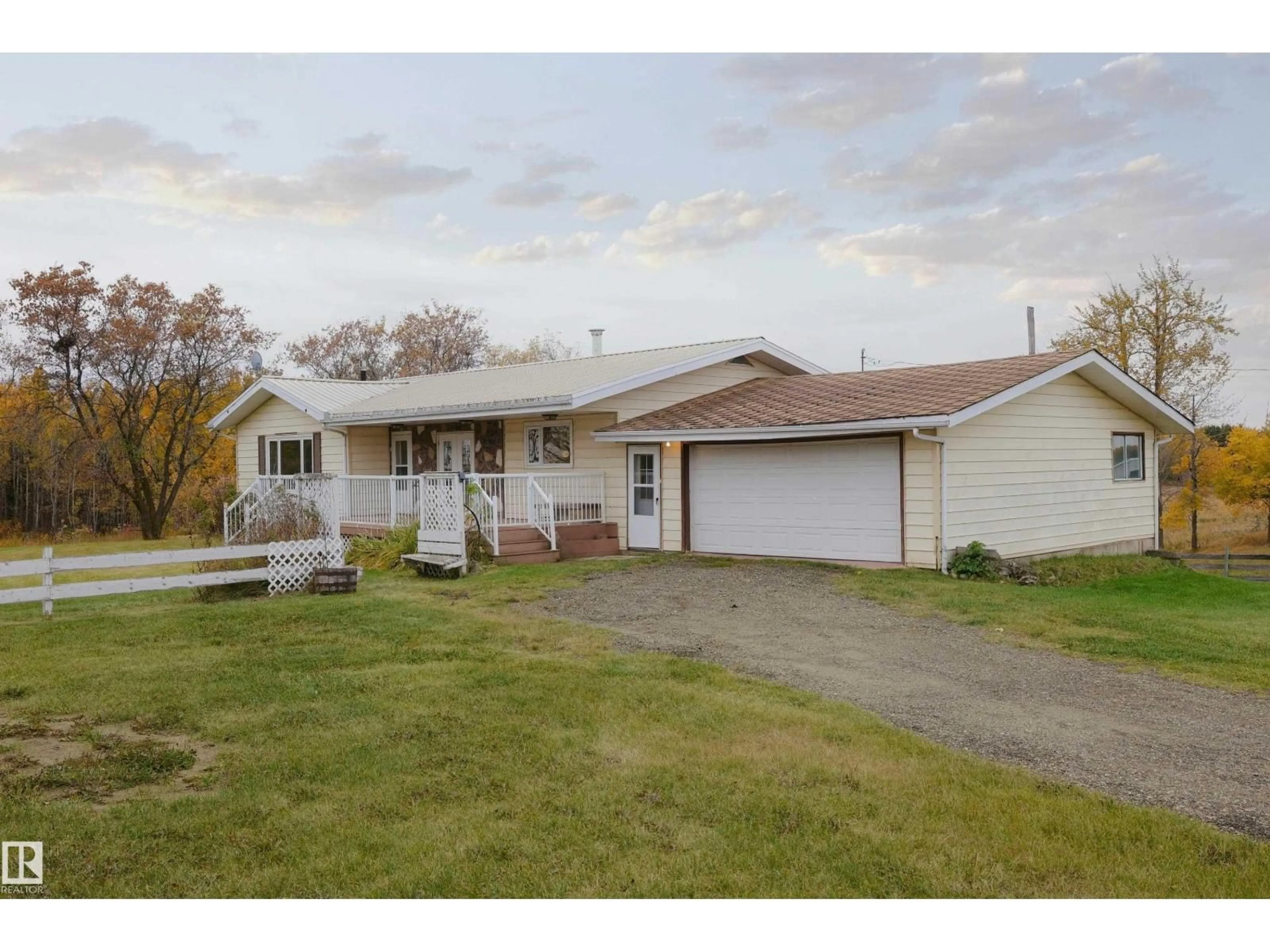 A pic from outside/outdoor area/front of a property/back of a property/a pic from drone, street for 61302 RGE RD 50, Rural Barrhead County Alberta T7N1N2