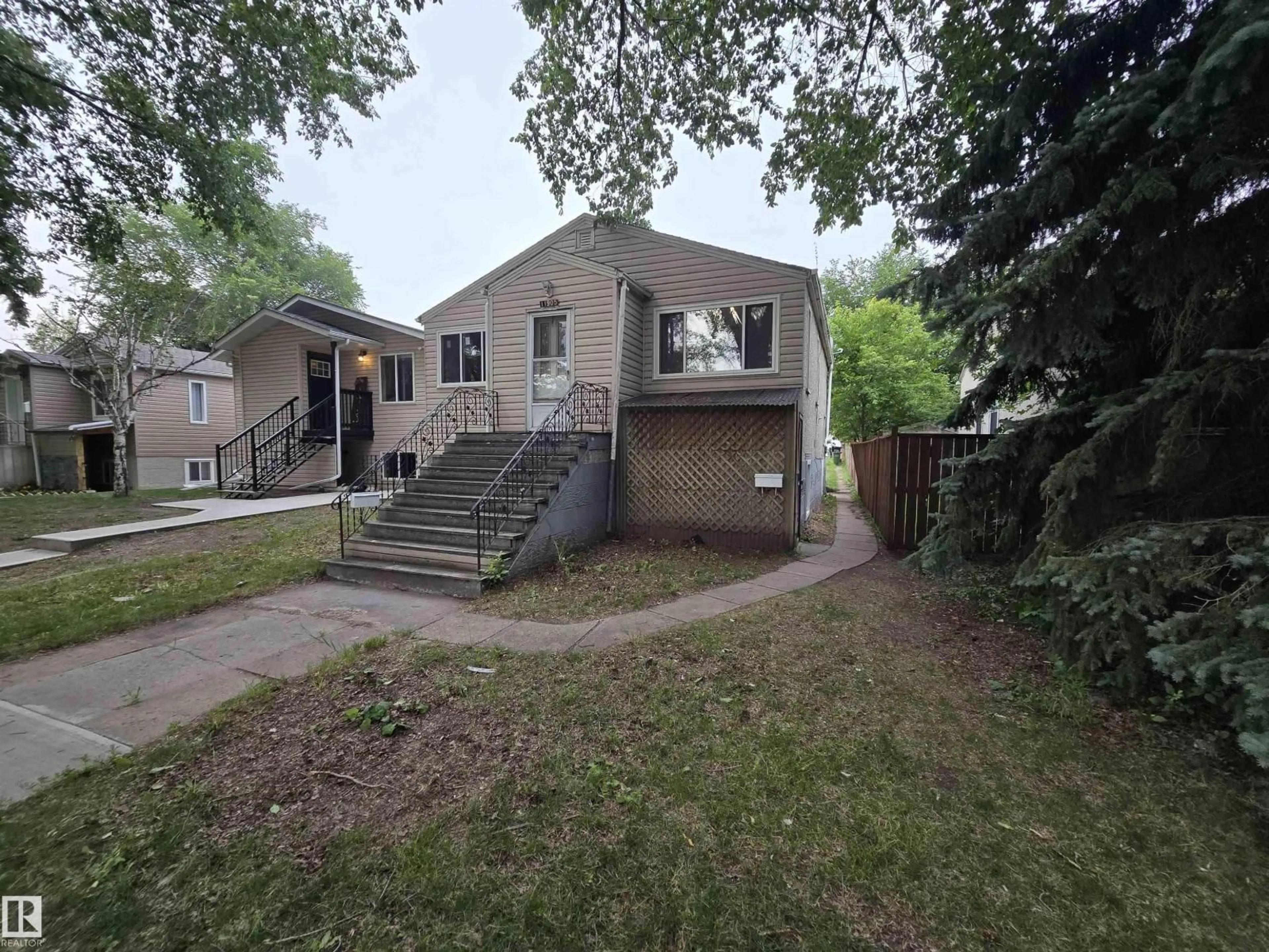A pic from outside/outdoor area/front of a property/back of a property/a pic from drone, street for 11905 70 ST, Edmonton Alberta T5B1V1