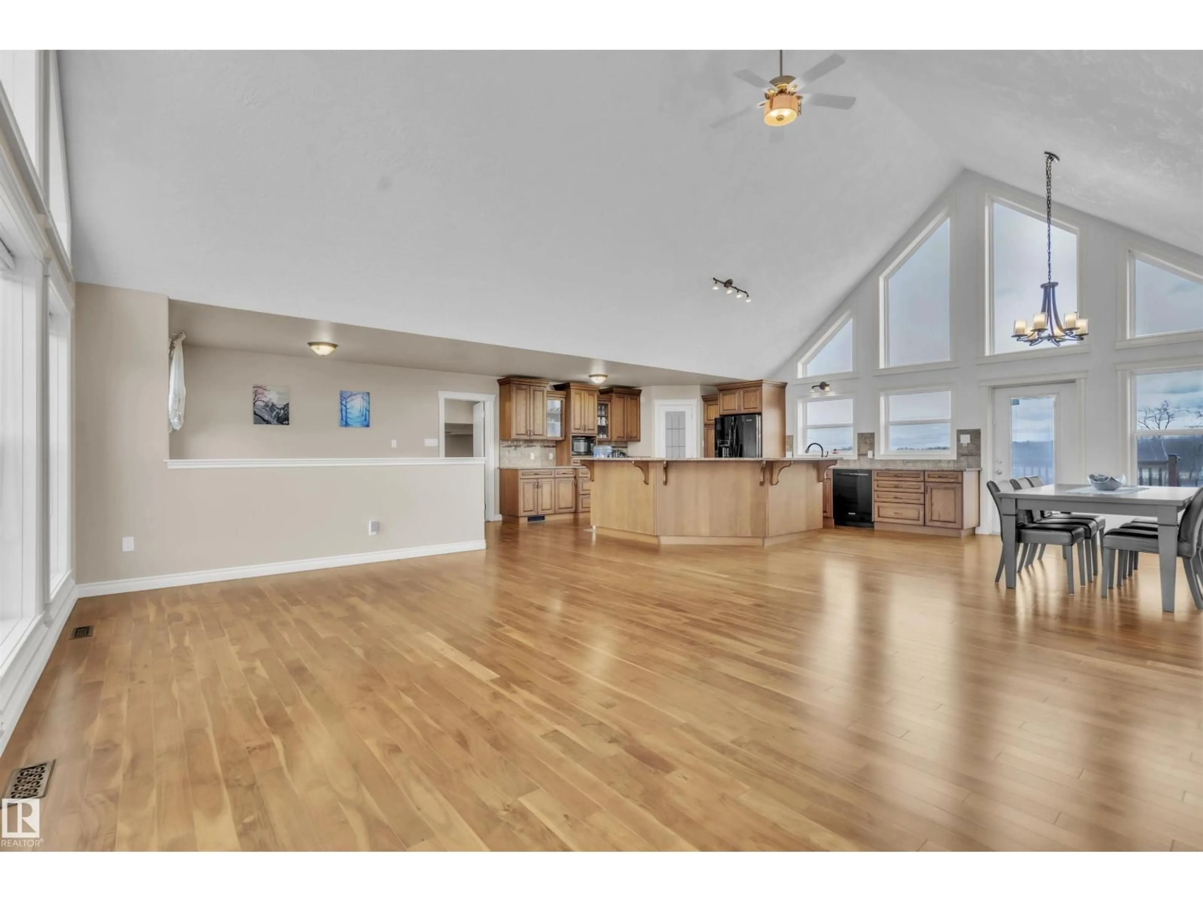 Open concept kitchen, wood/laminate floor for 62515 RANGE ROAD 444, Rural Bonnyville M.D. Alberta T0V0B0