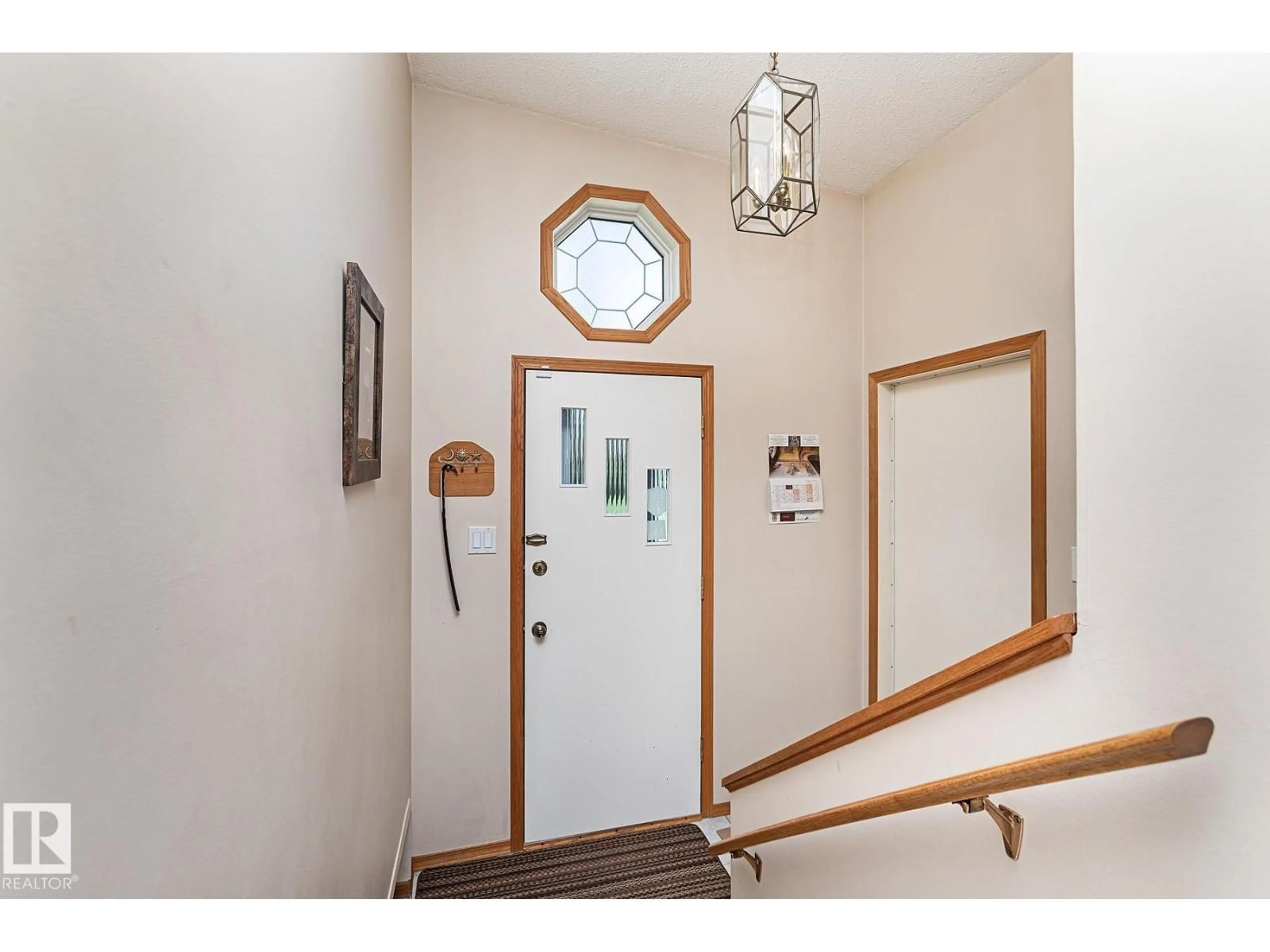 Indoor entryway for 9523 134 AV, Edmonton Alberta T5E1H8