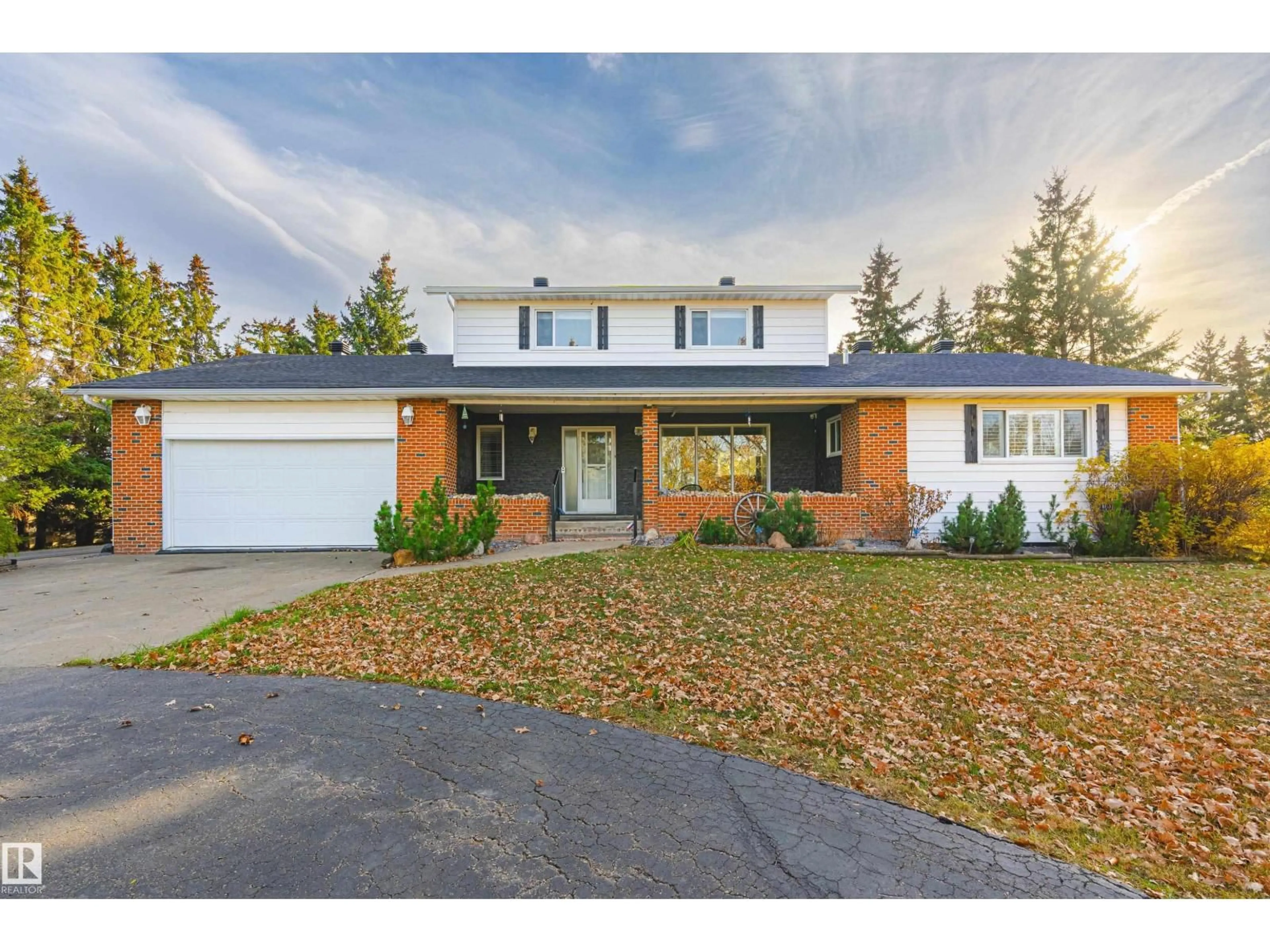 Home with brick exterior material, street for 25317 TWP 580, Rural Sturgeon County Alberta T0G1L1