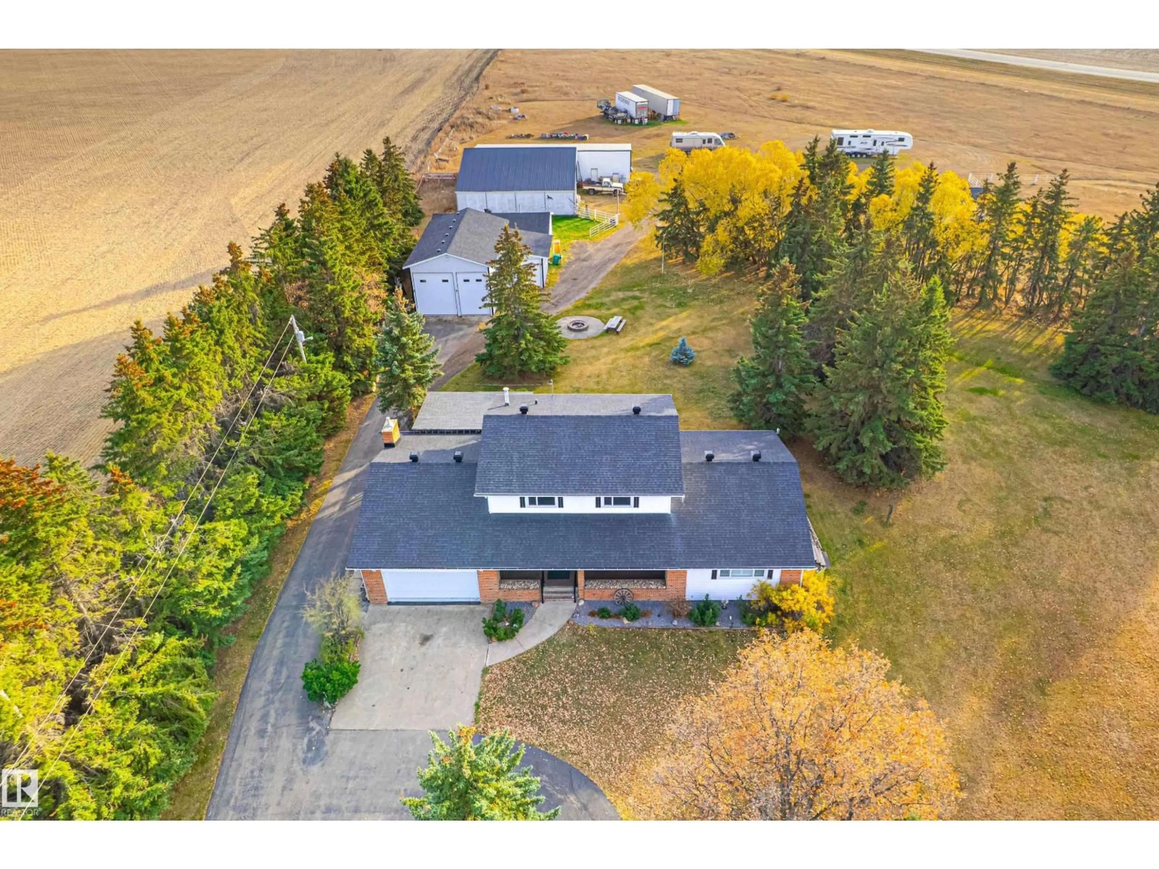 A pic from outside/outdoor area/front of a property/back of a property/a pic from drone, street for 25317 TWP 580, Rural Sturgeon County Alberta T0G1L1