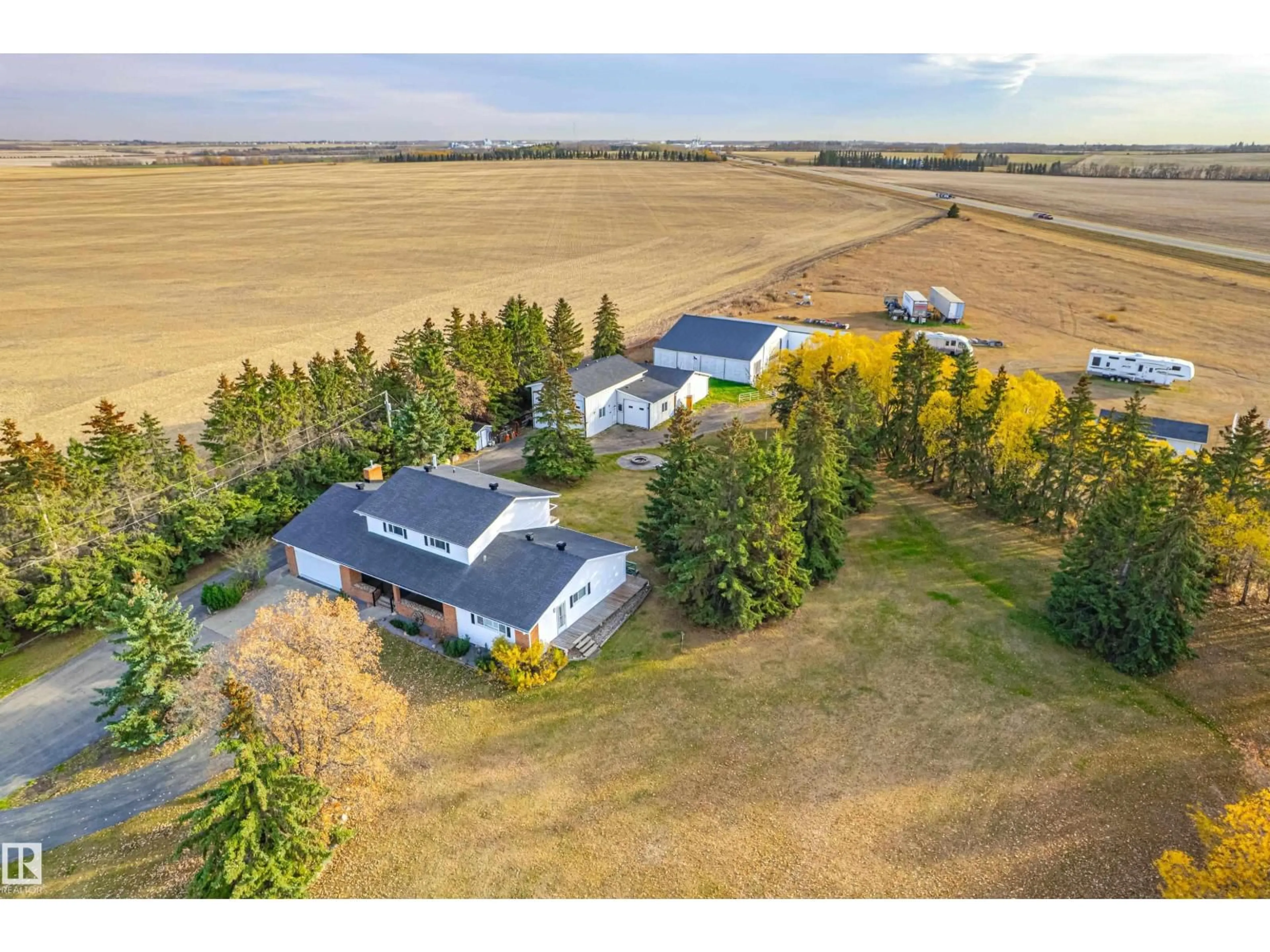 A pic from outside/outdoor area/front of a property/back of a property/a pic from drone, unknown for 25317 TWP 580, Rural Sturgeon County Alberta T0G1L1