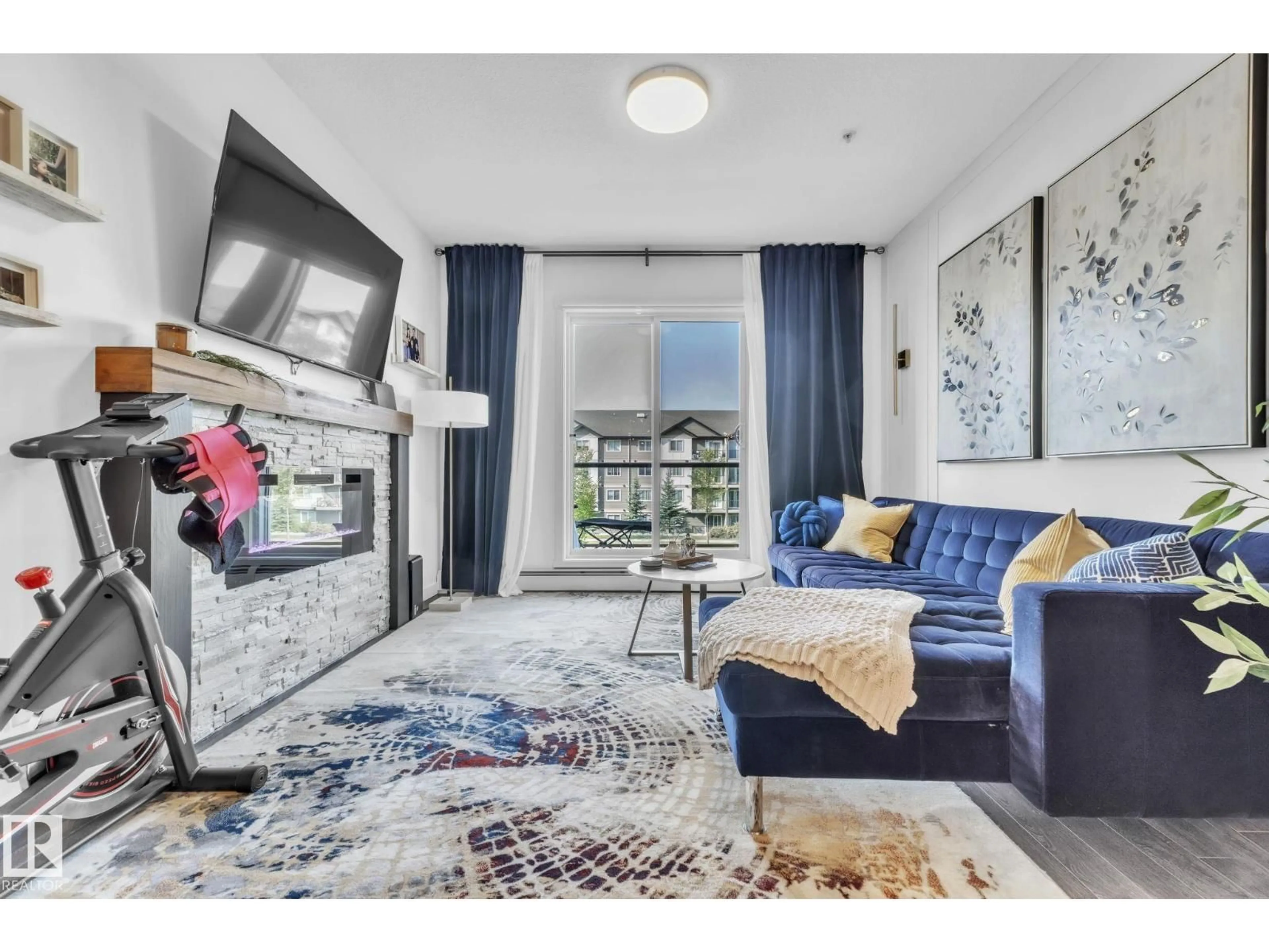 Living room with furniture, carpet floor for 203 - 812 WELSH DR, Edmonton Alberta T6X1Y7