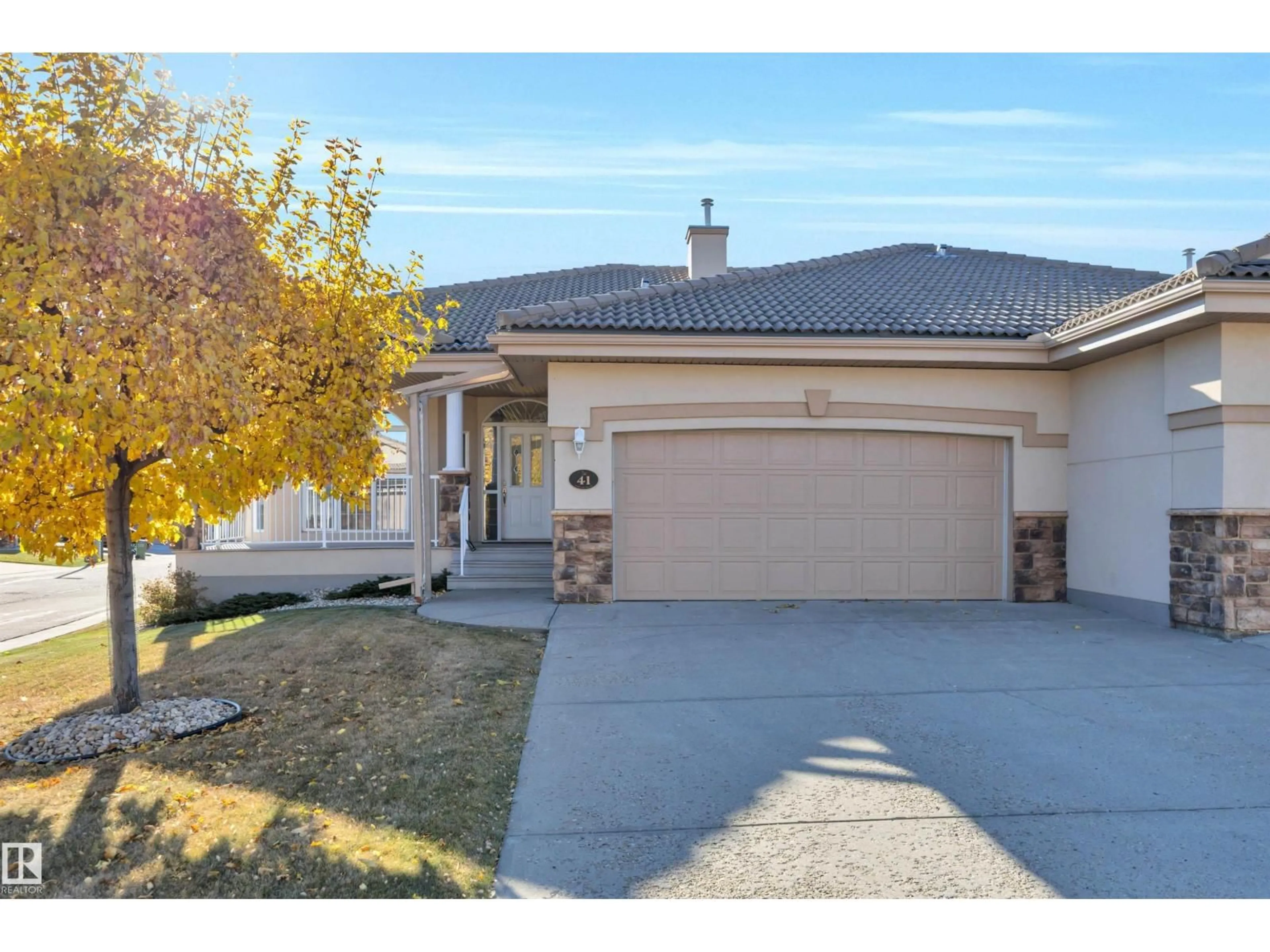 Home with vinyl exterior material, street for #41 - 13808 155 AV, Edmonton Alberta T6V1T8