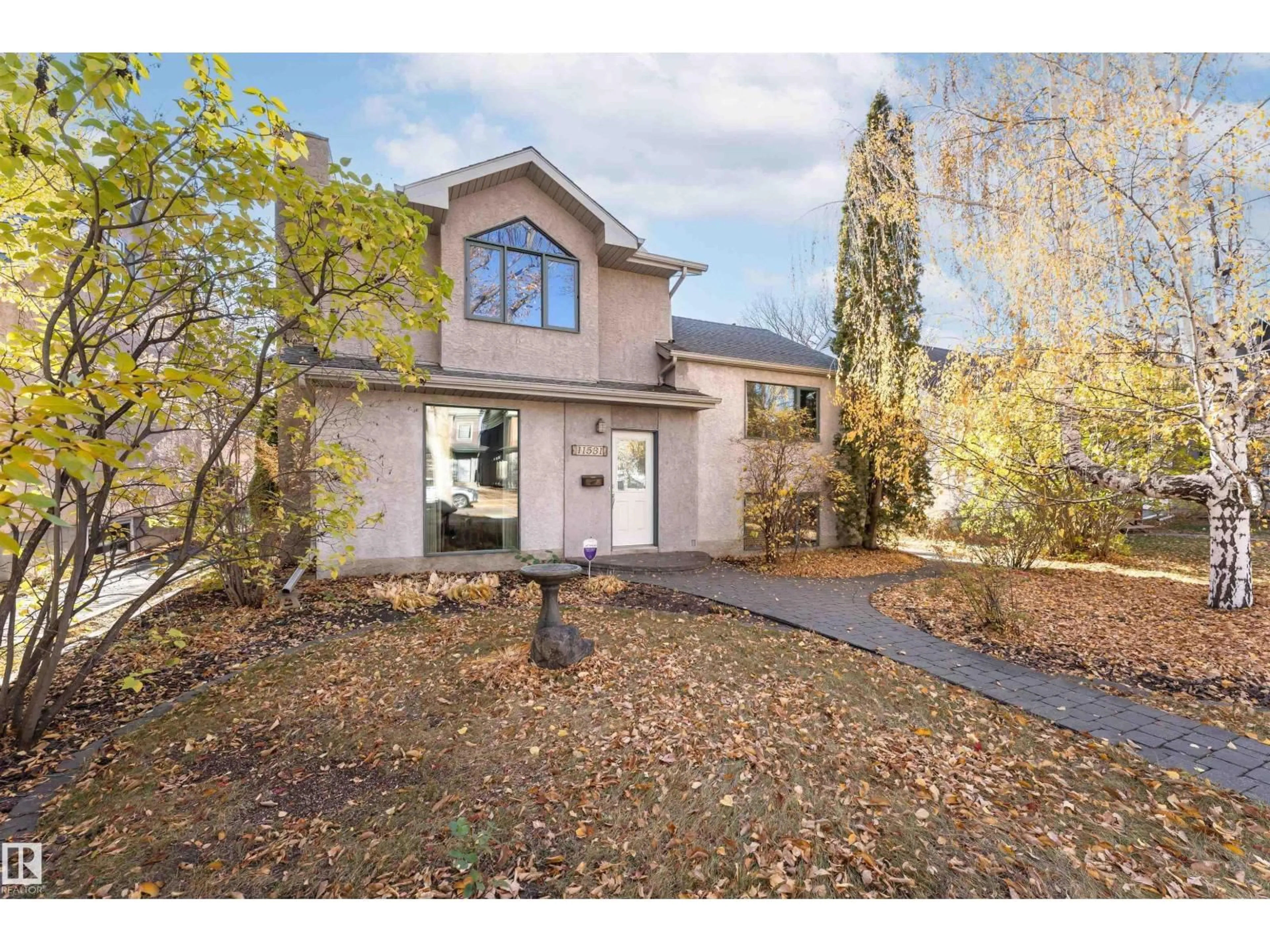 A pic from outside/outdoor area/front of a property/back of a property/a pic from drone, street for 11531 78 AV, Edmonton Alberta T6G0N4