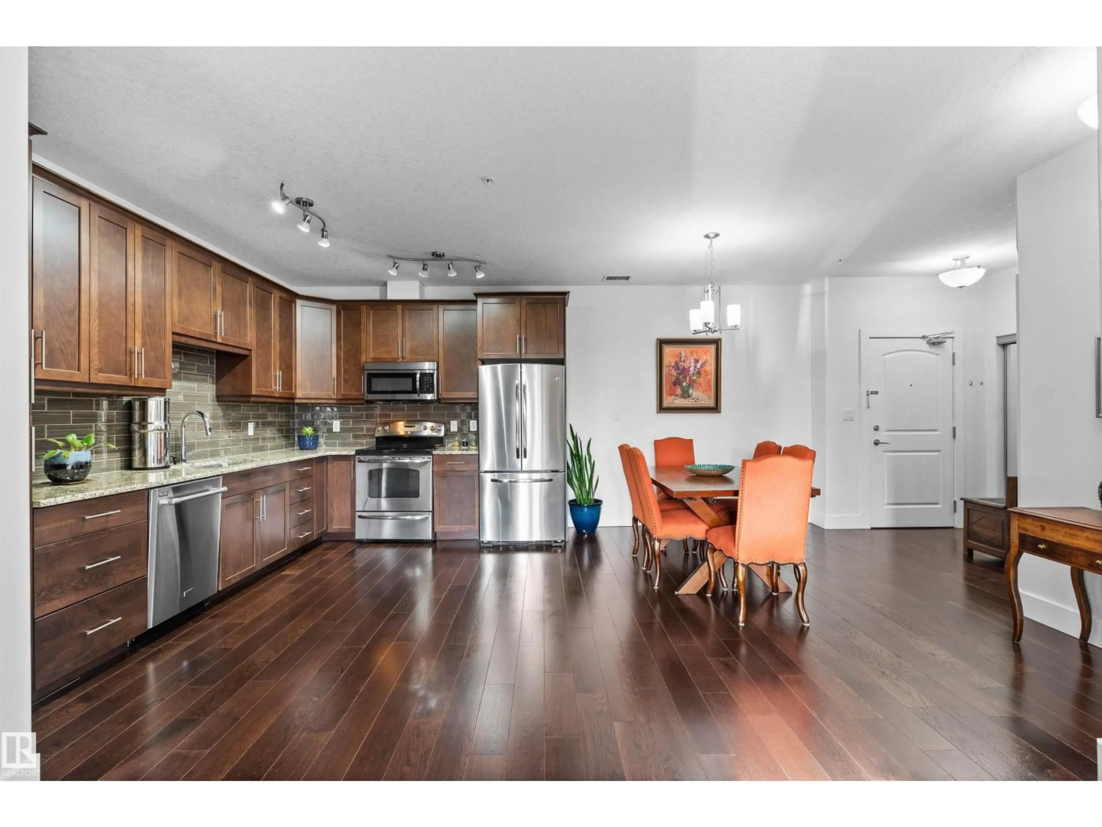 Open concept kitchen, unknown for 356 - 6079 MAYNARD WY, Edmonton Alberta T6R0S4