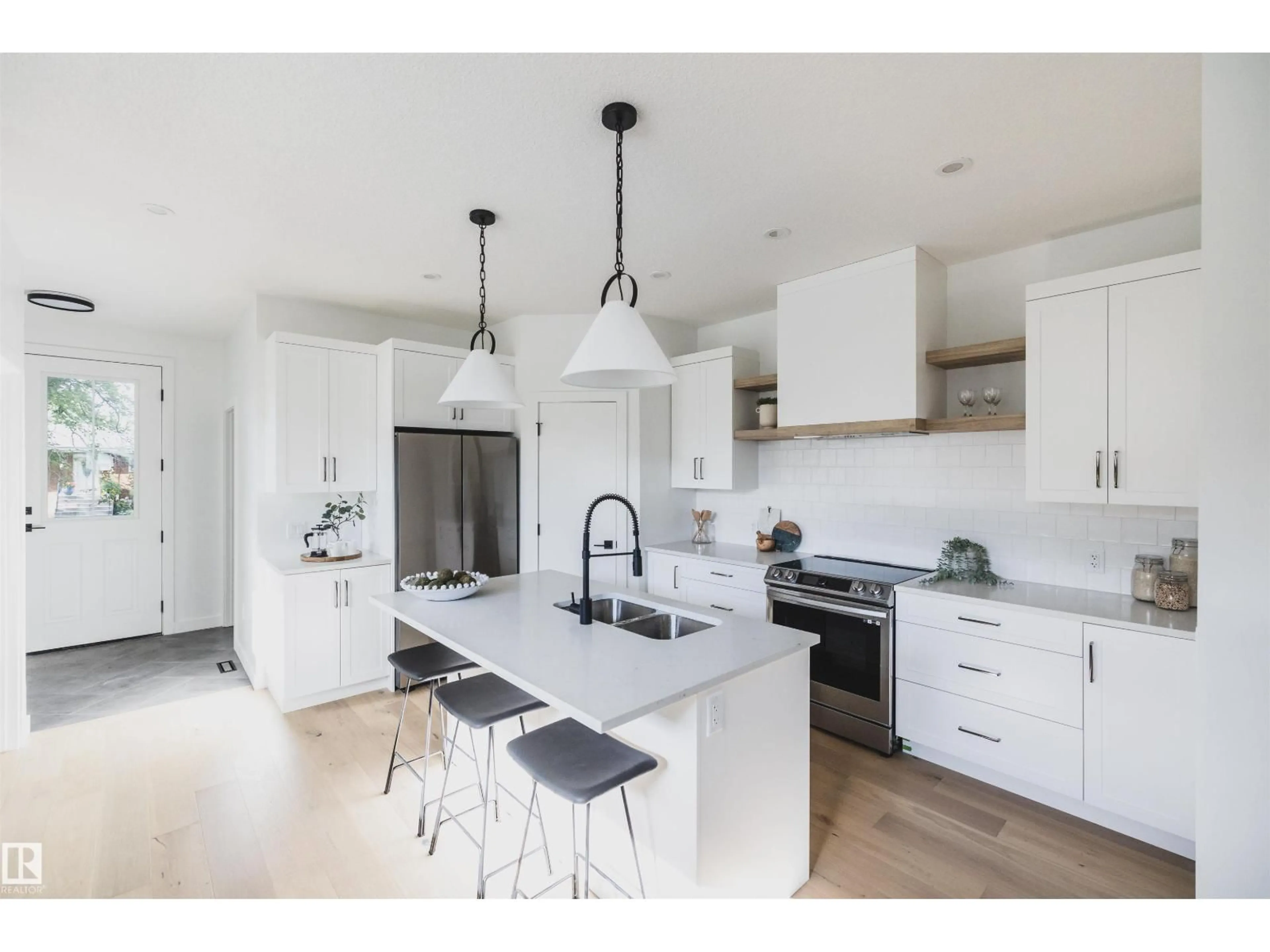 Open concept kitchen, ceramic/tile floor for 4216 121 ST NW, Edmonton Alberta T6J1Y8