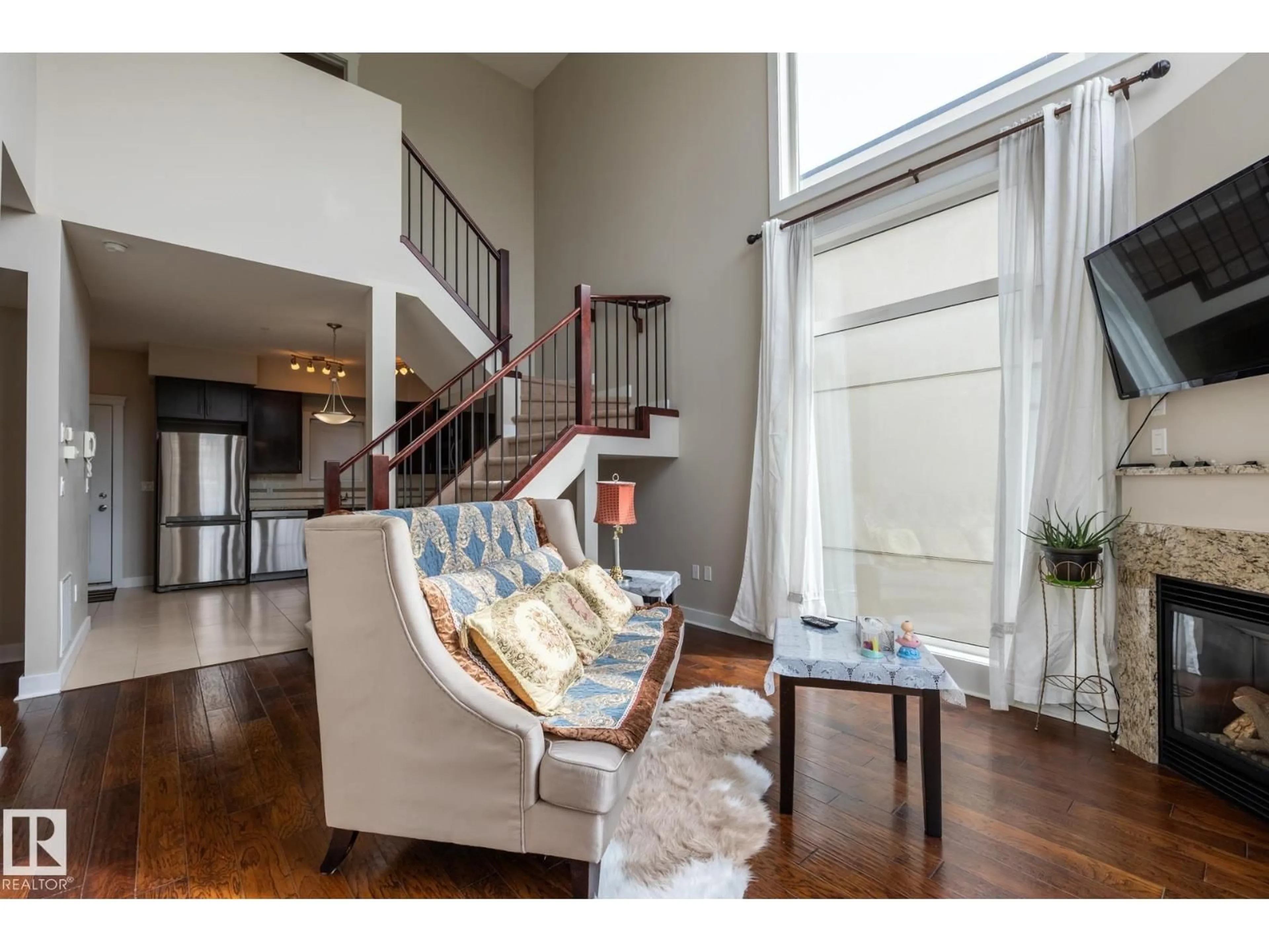 Living room with furniture, wood/laminate floor for #37 - 11518 76 AV, Edmonton Alberta T6G0K7