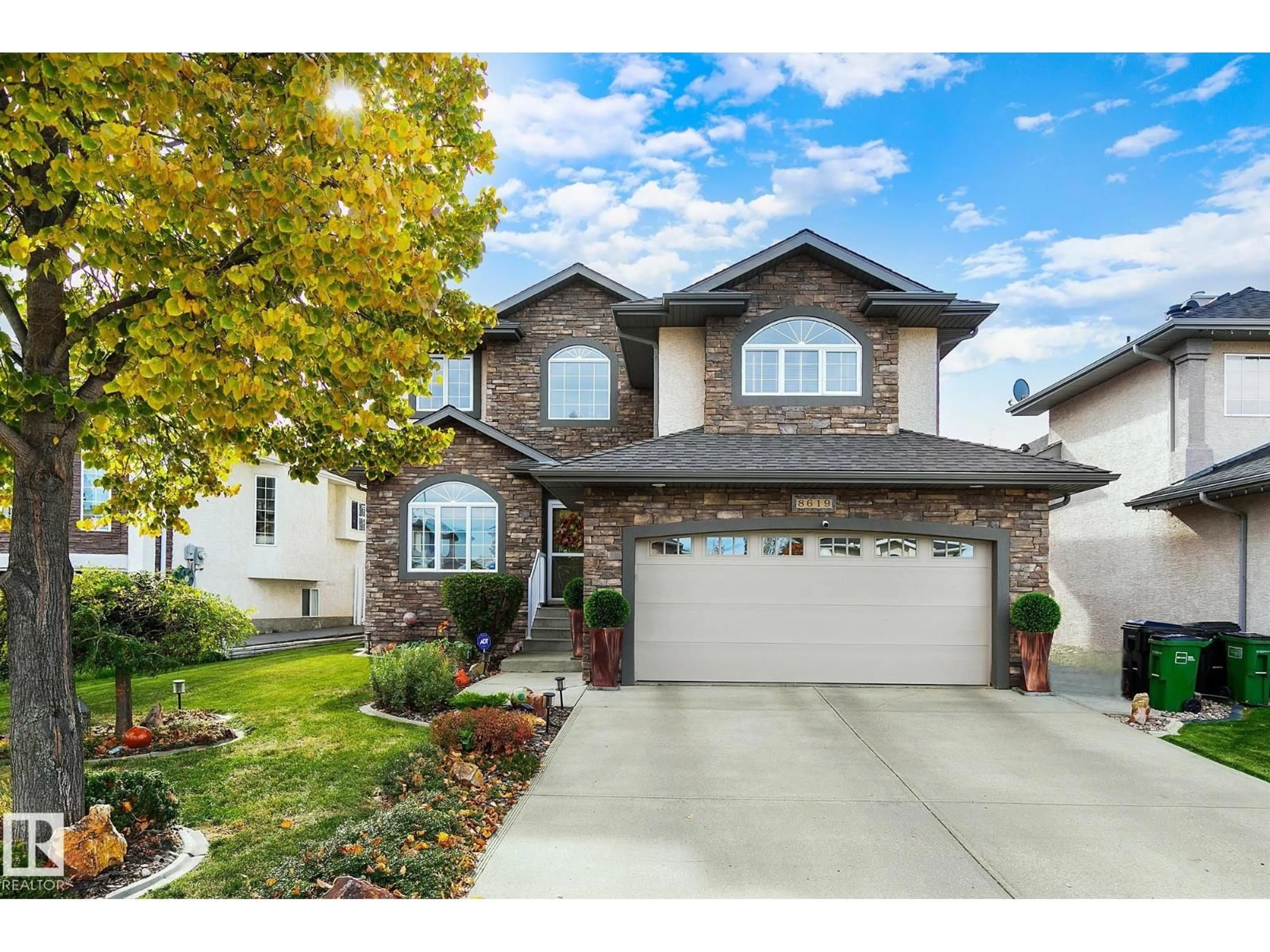 Home with vinyl exterior material, street for 8619 160 AV, Edmonton Alberta T5Z3H9