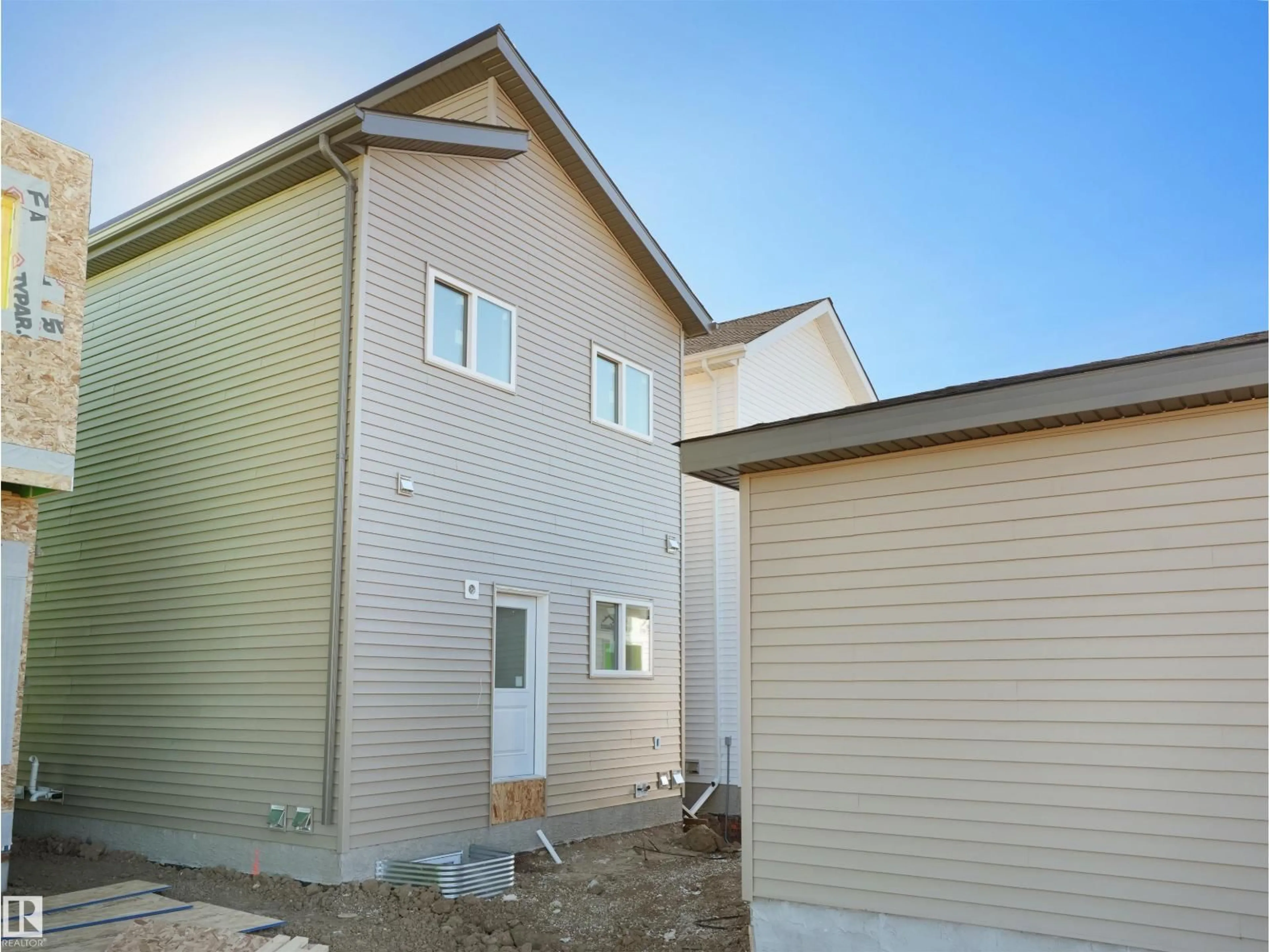 Home with vinyl exterior material, building for 432 CRYSTAL CREEK LINK, Leduc Alberta T9E0X5