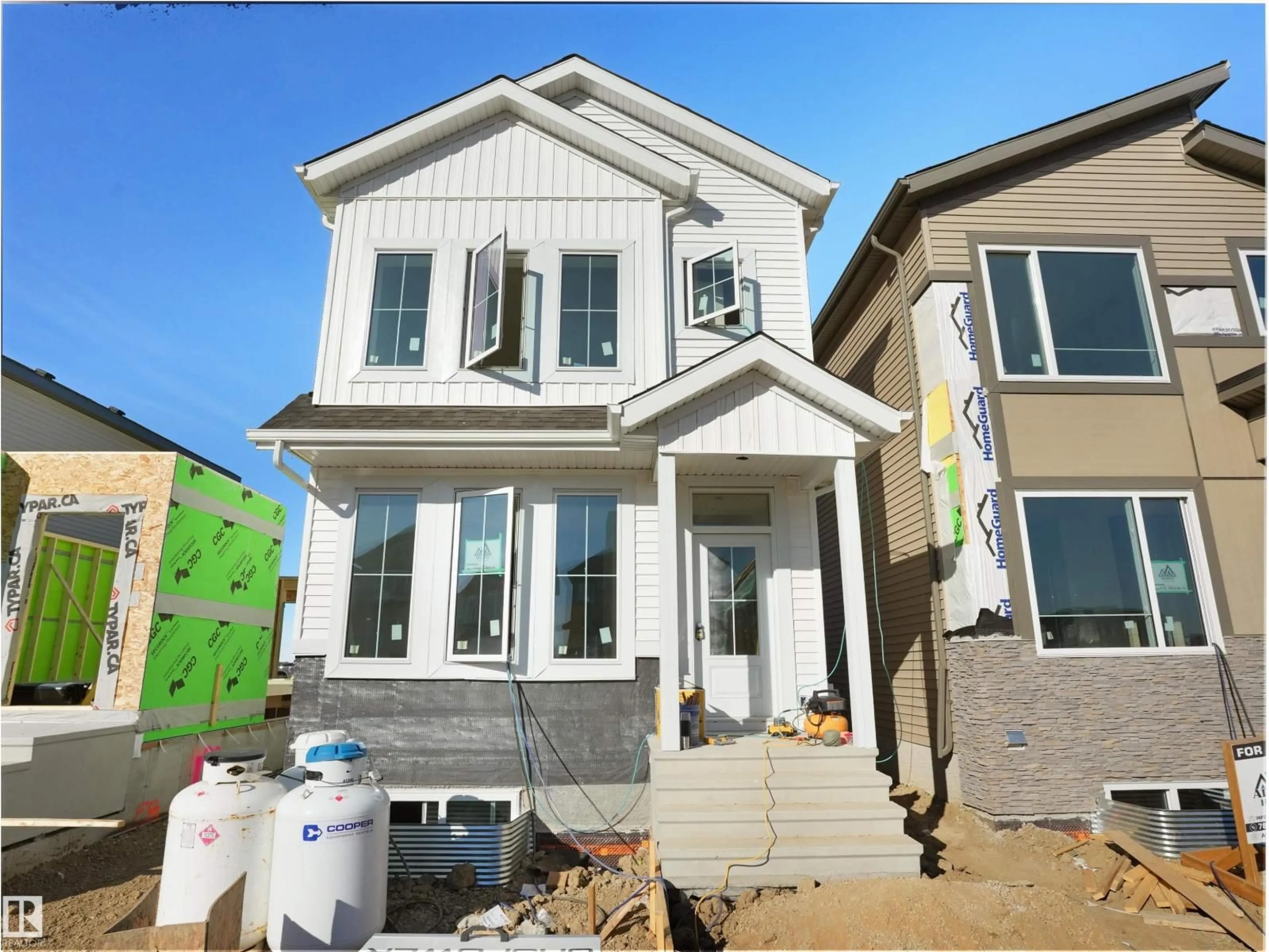 Home with vinyl exterior material, street for 434 CRYSTAL CREEK LINK, Leduc Alberta T9E0X5