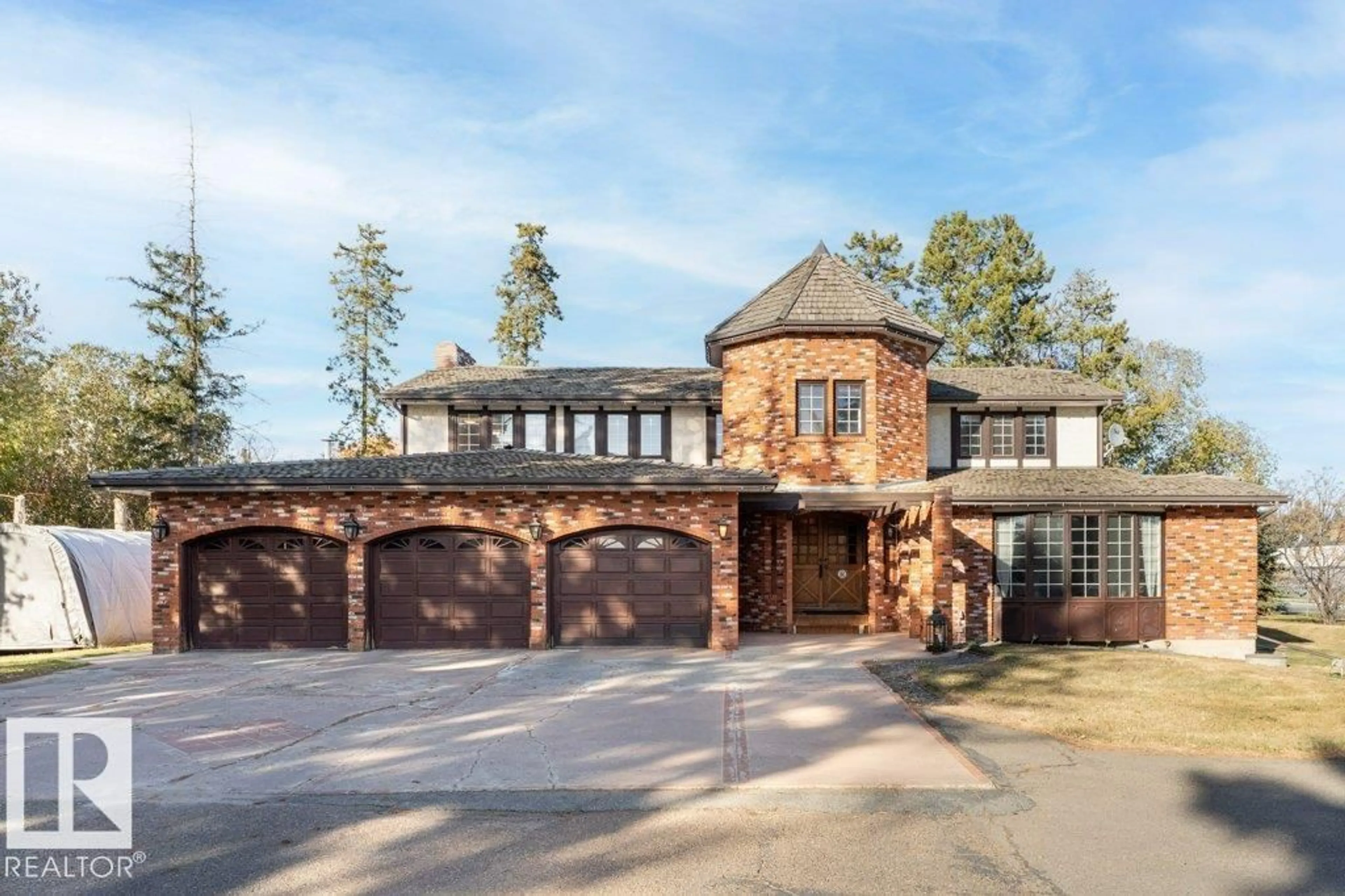 Home with brick exterior material, unknown for 7550 ELLERSLIE RD, Edmonton Alberta T6X1A3