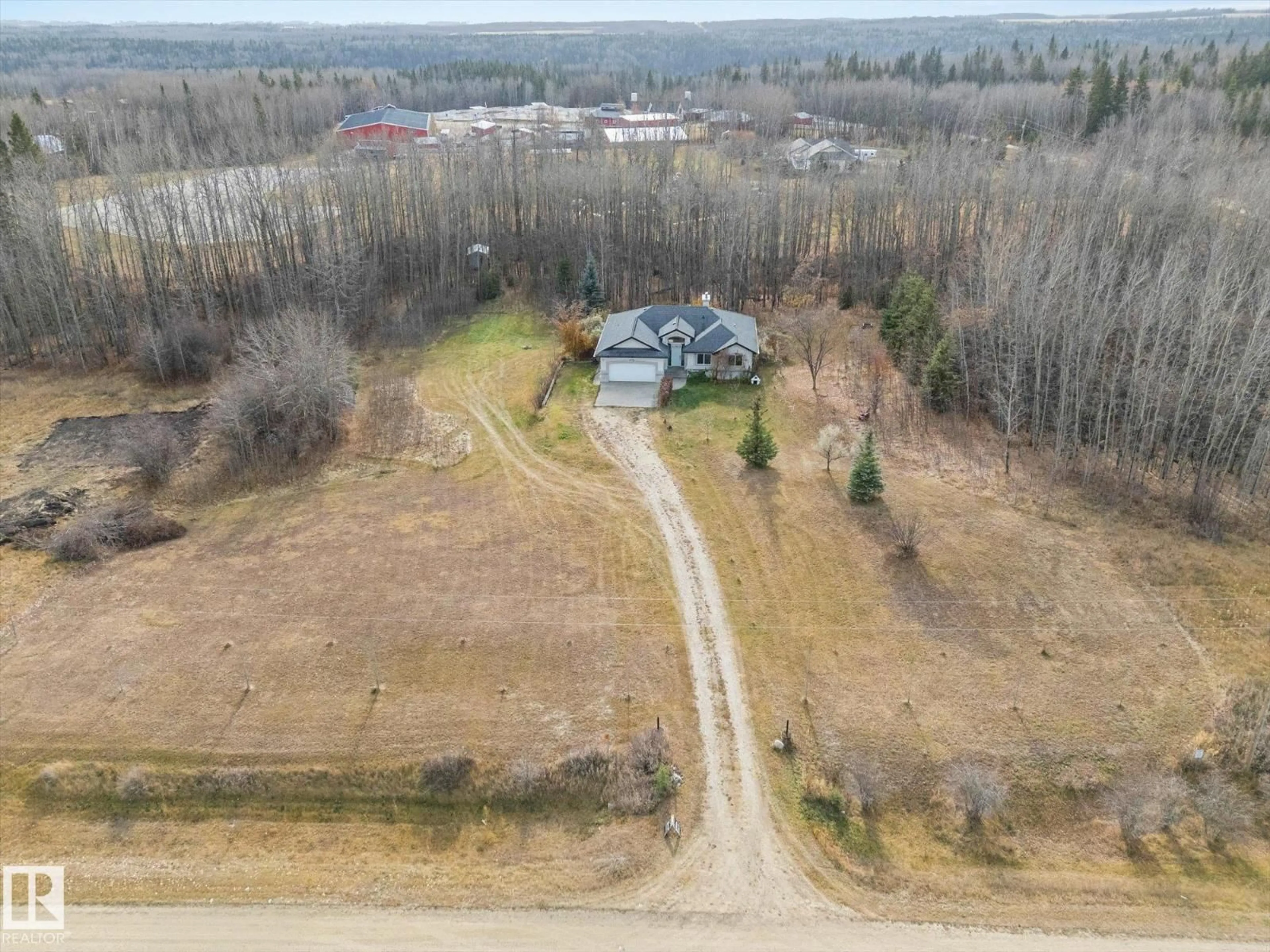 A pic from outside/outdoor area/front of a property/back of a property/a pic from drone, unknown for #16 - 1319 TWP ROAD 510, Rural Parkland County Alberta T7Y2N2